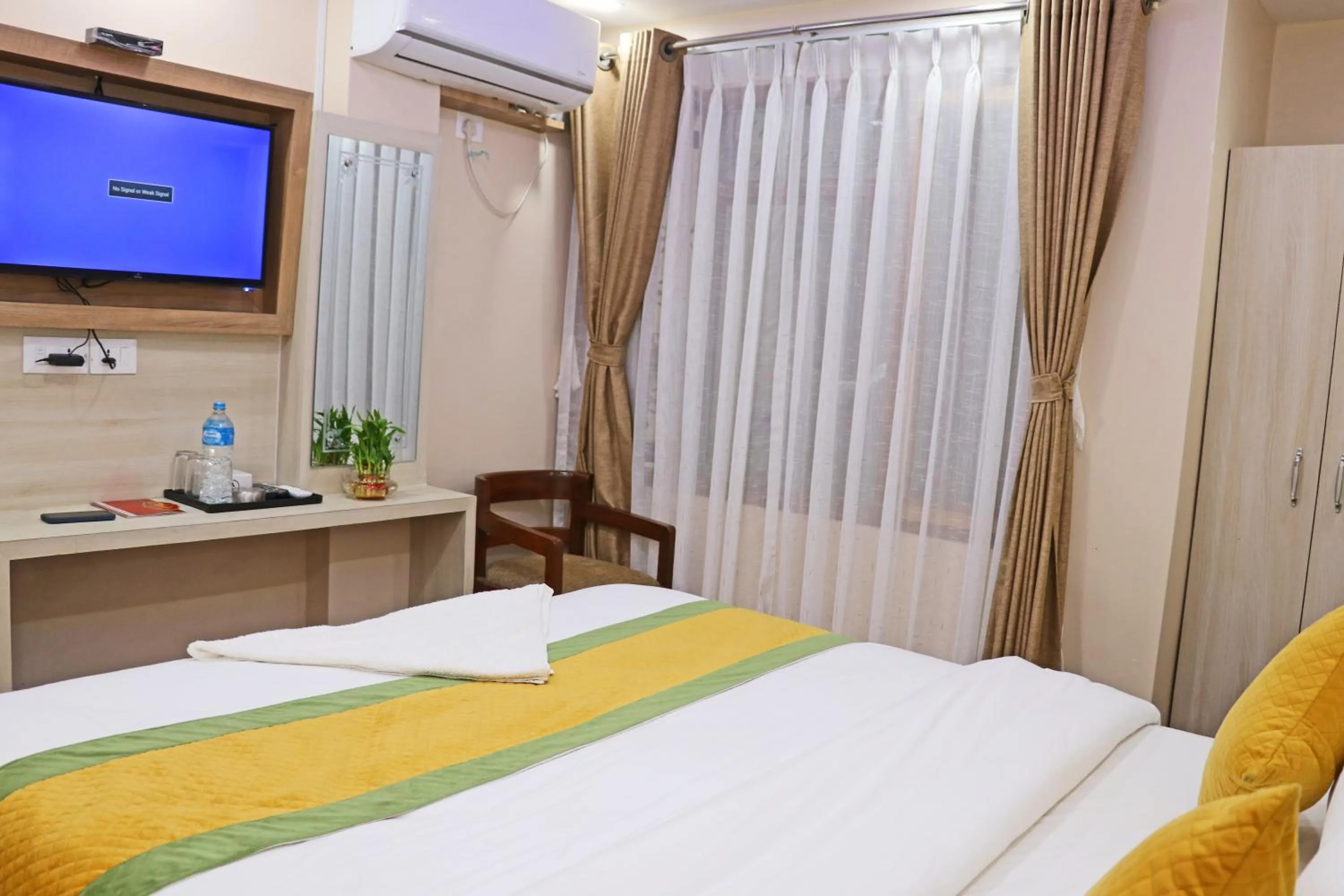 Bed in Hotel Aaradhya