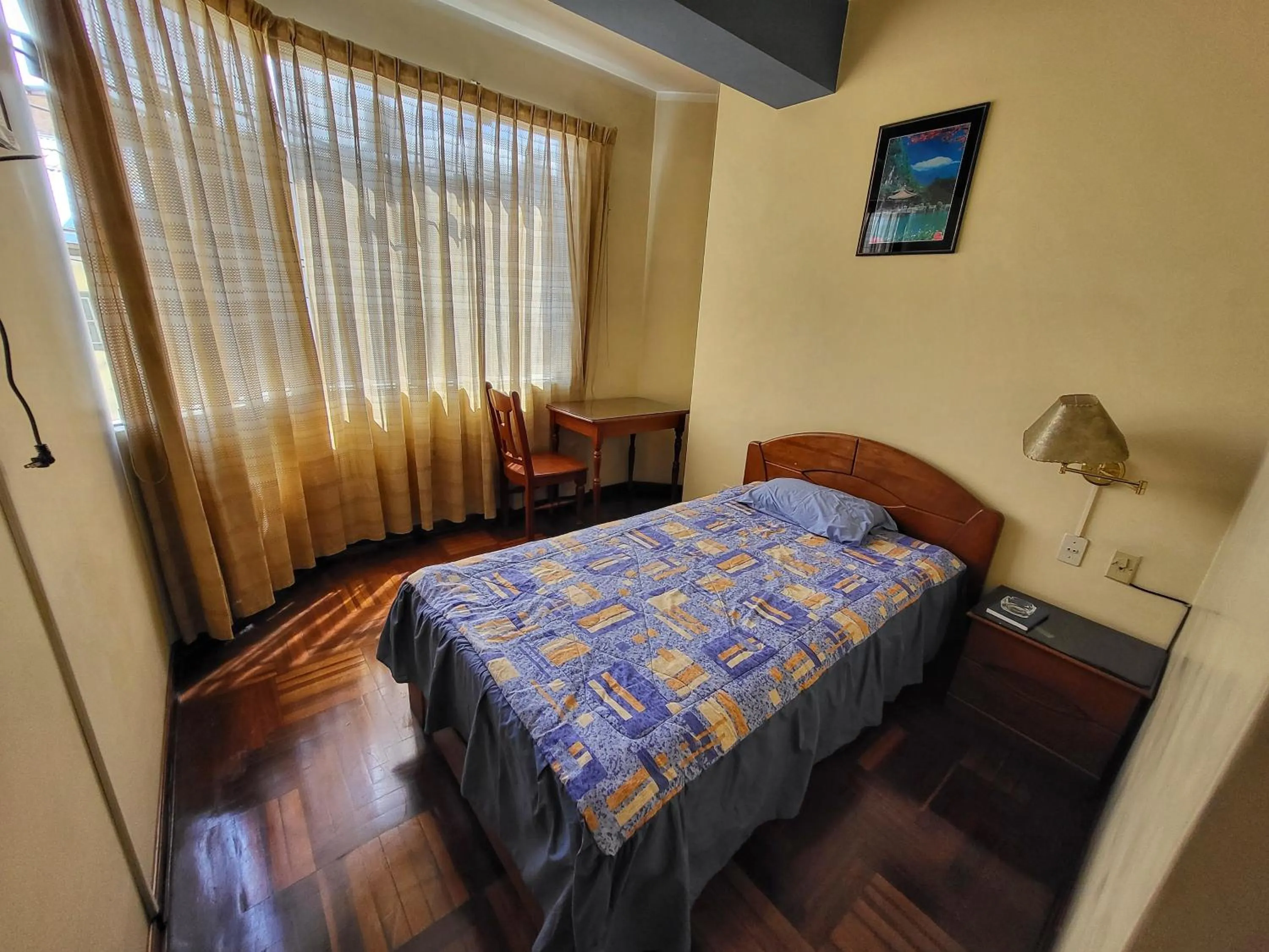 Bed in D'Cardenas Hotel