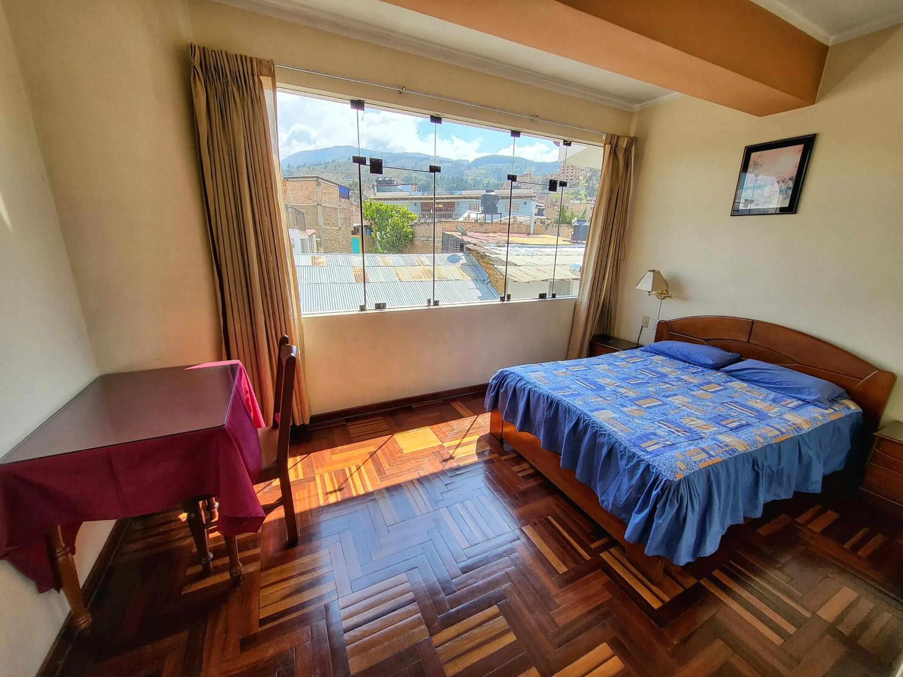 Bed in D'Cardenas Hotel