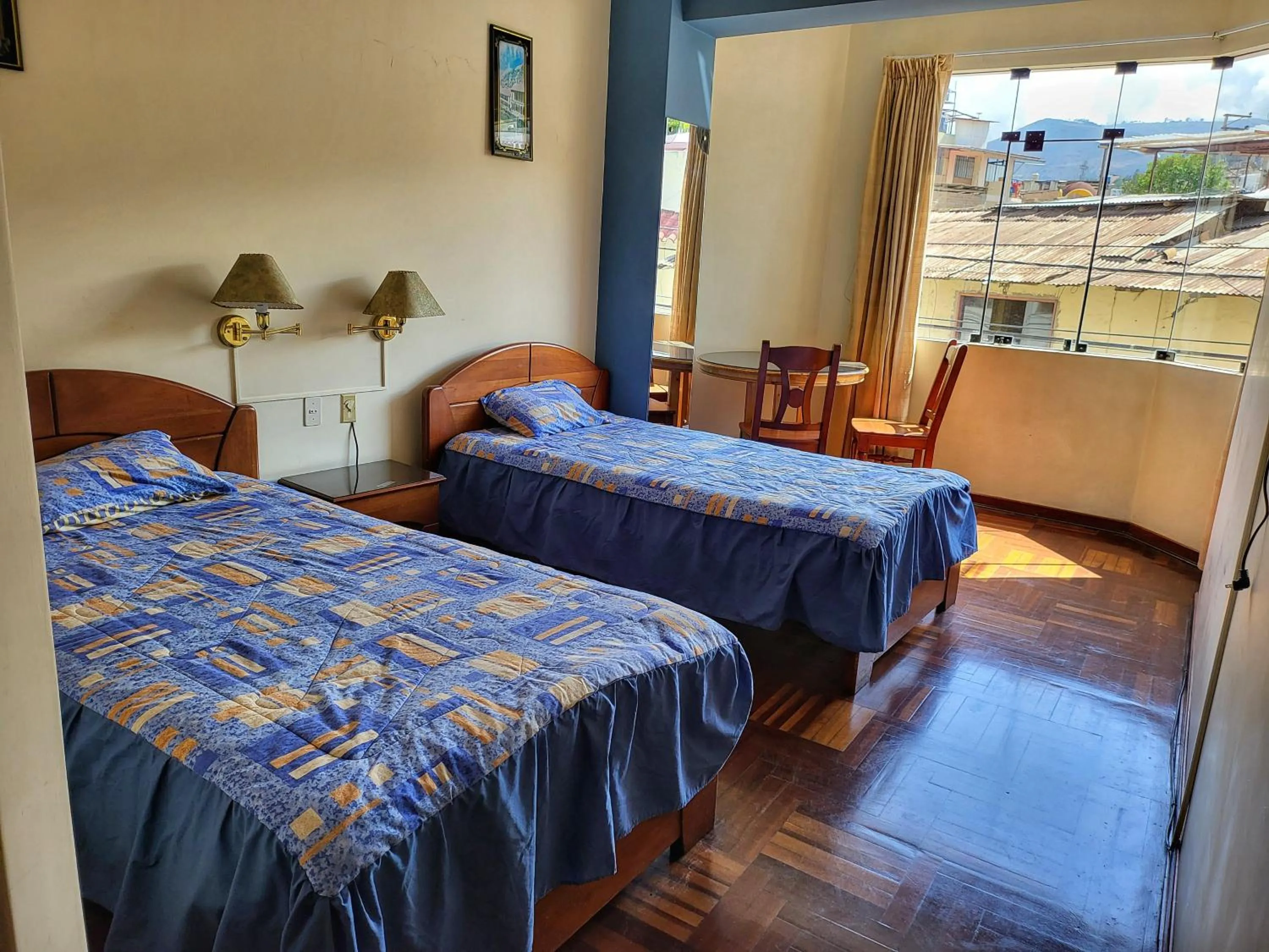 Bed in D'Cardenas Hotel