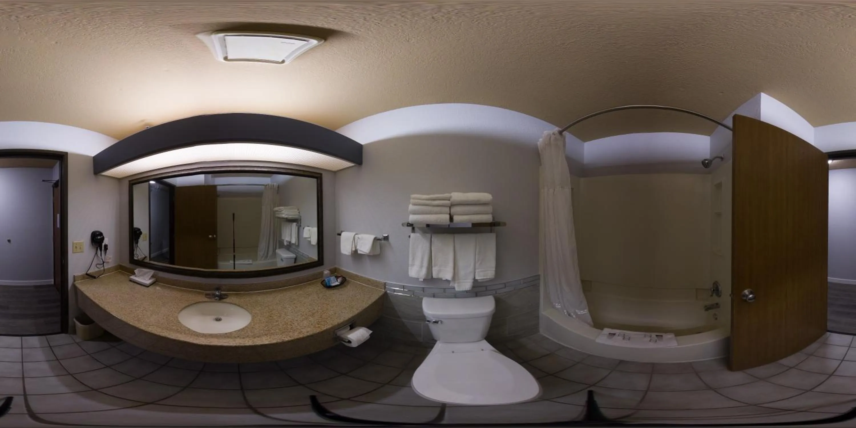 Bathroom in Coratel Inn and Suites By Jasper Eagan ST Paul Airport & Mall of America