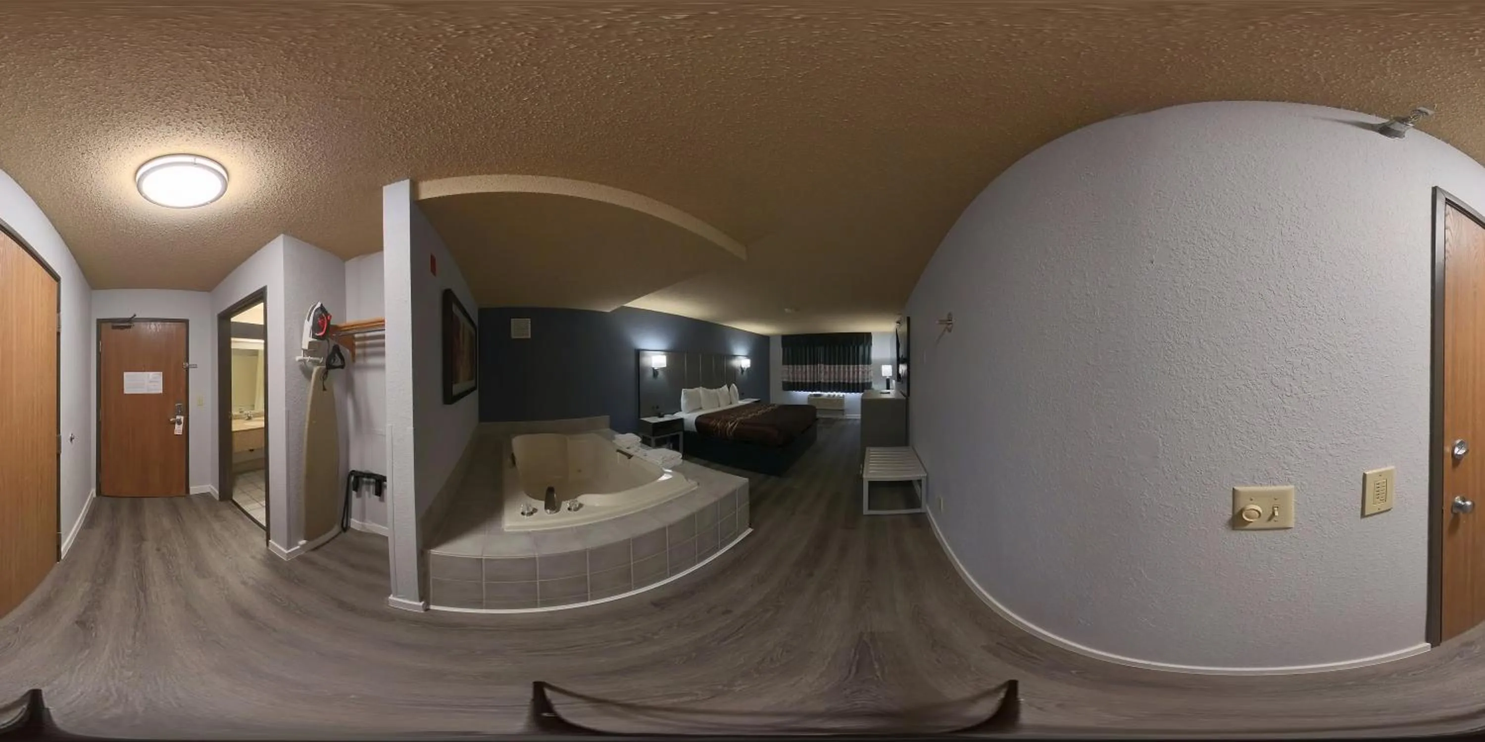 Bedroom in Coratel Inn and Suites By Jasper Eagan ST Paul Airport & Mall of America