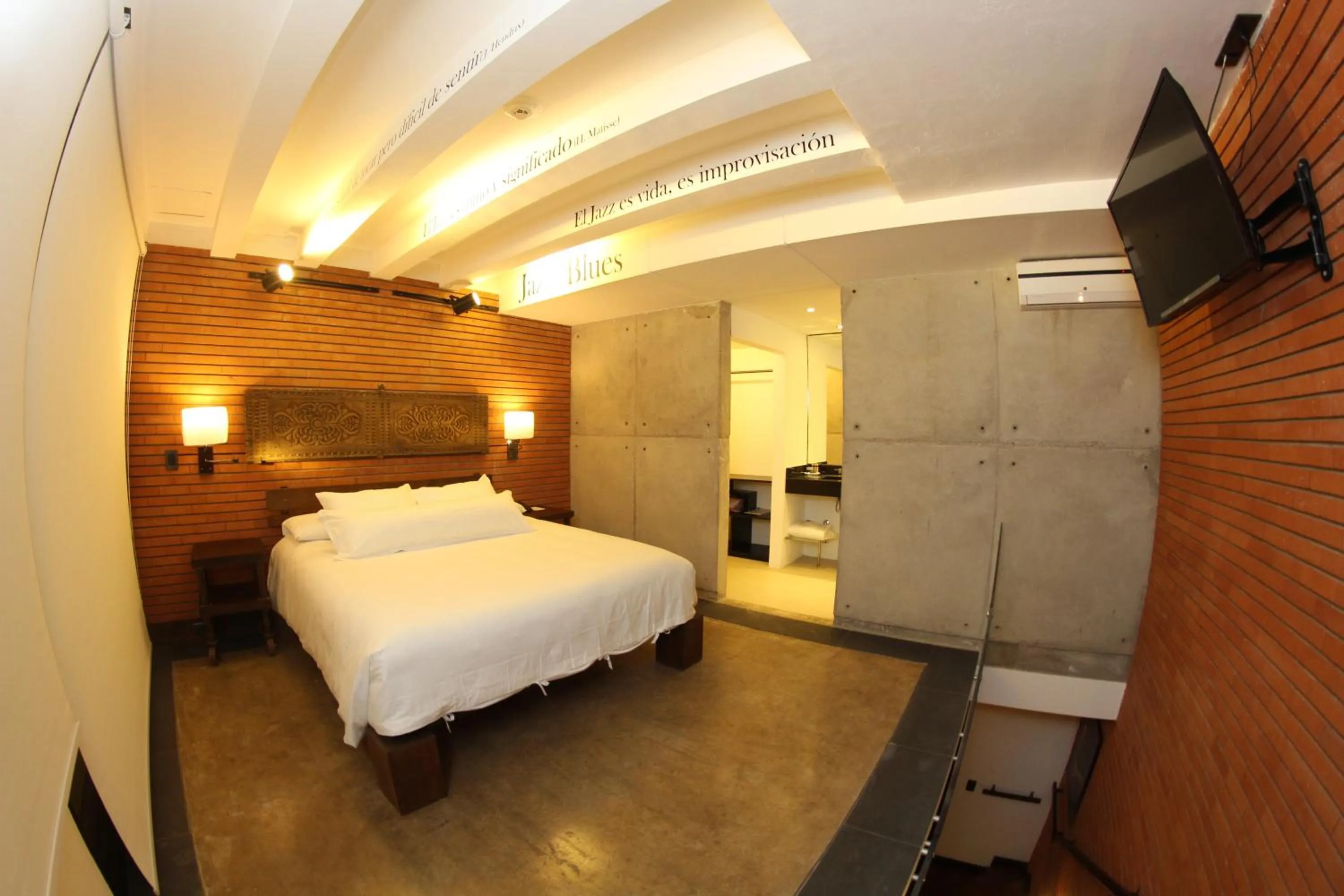 Bed in Alfonsina Hotel Boutique