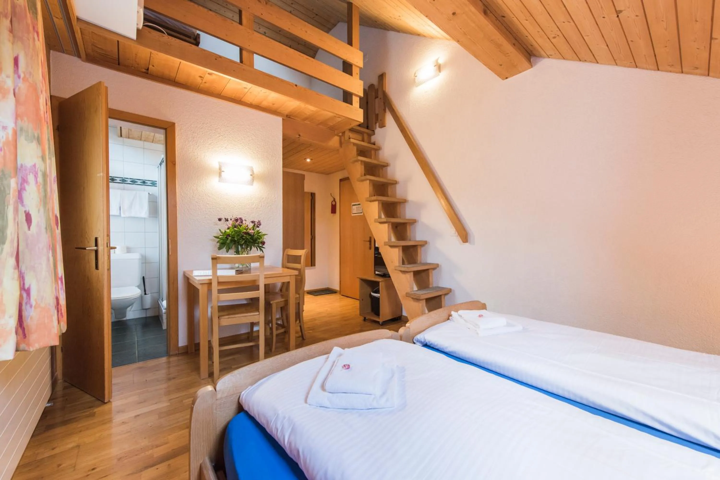 Photo of the whole room, Bed in Hotel Alpenrose beim Ballenberg