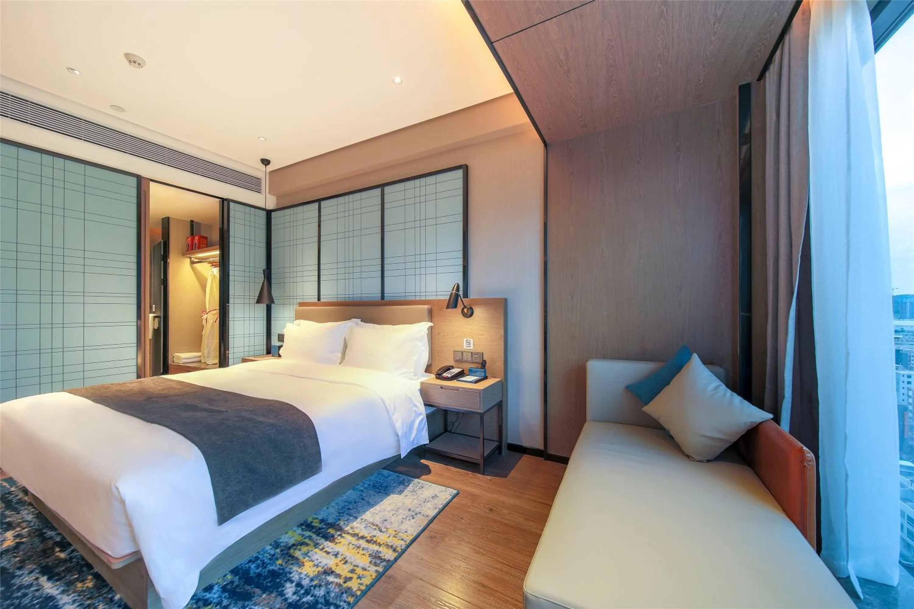 Bed in Echarm Hotel Heyuan Jianji Wanda Plaza