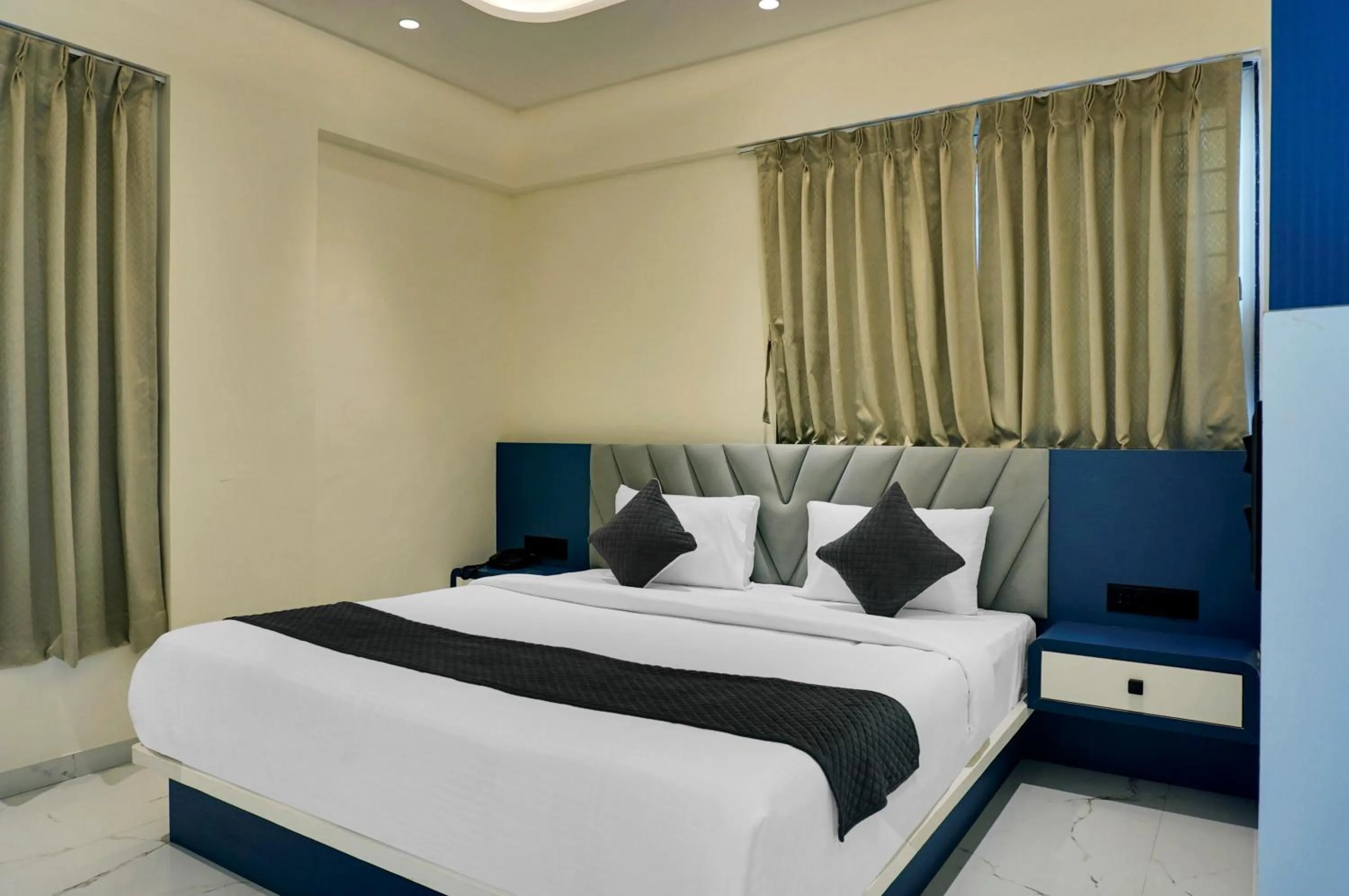 Bed in Palm Suites Baner- indian nationals only