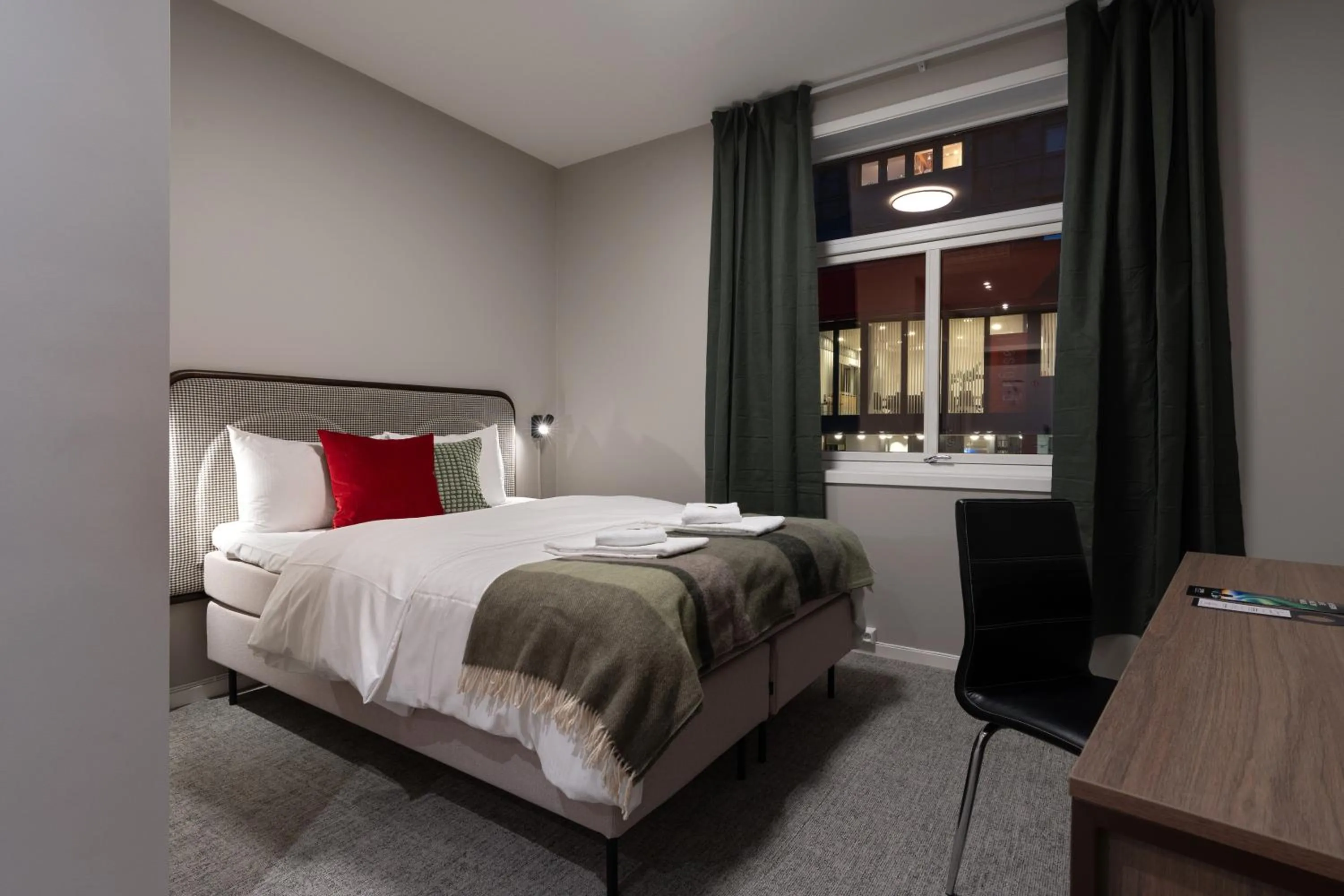 Bed in Enter Skansen Hotel