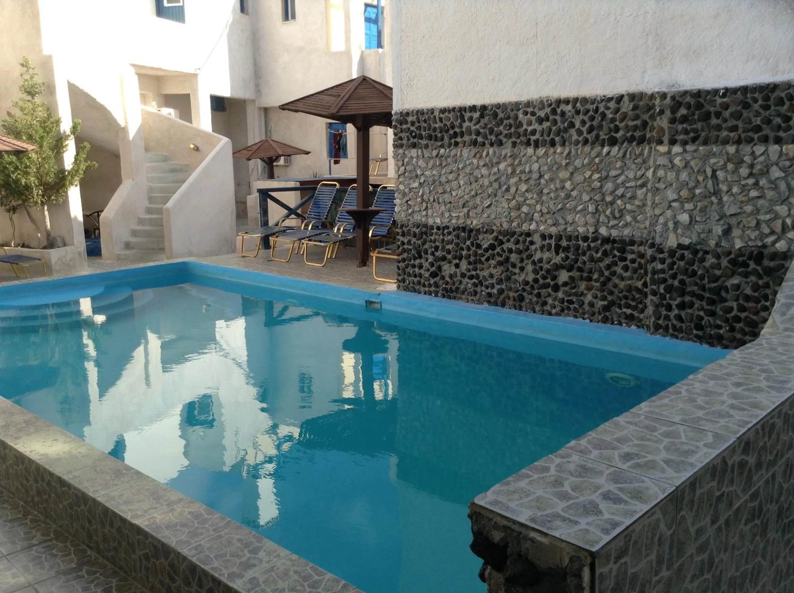 Swimming pool in Rooms to let Katerina & John's