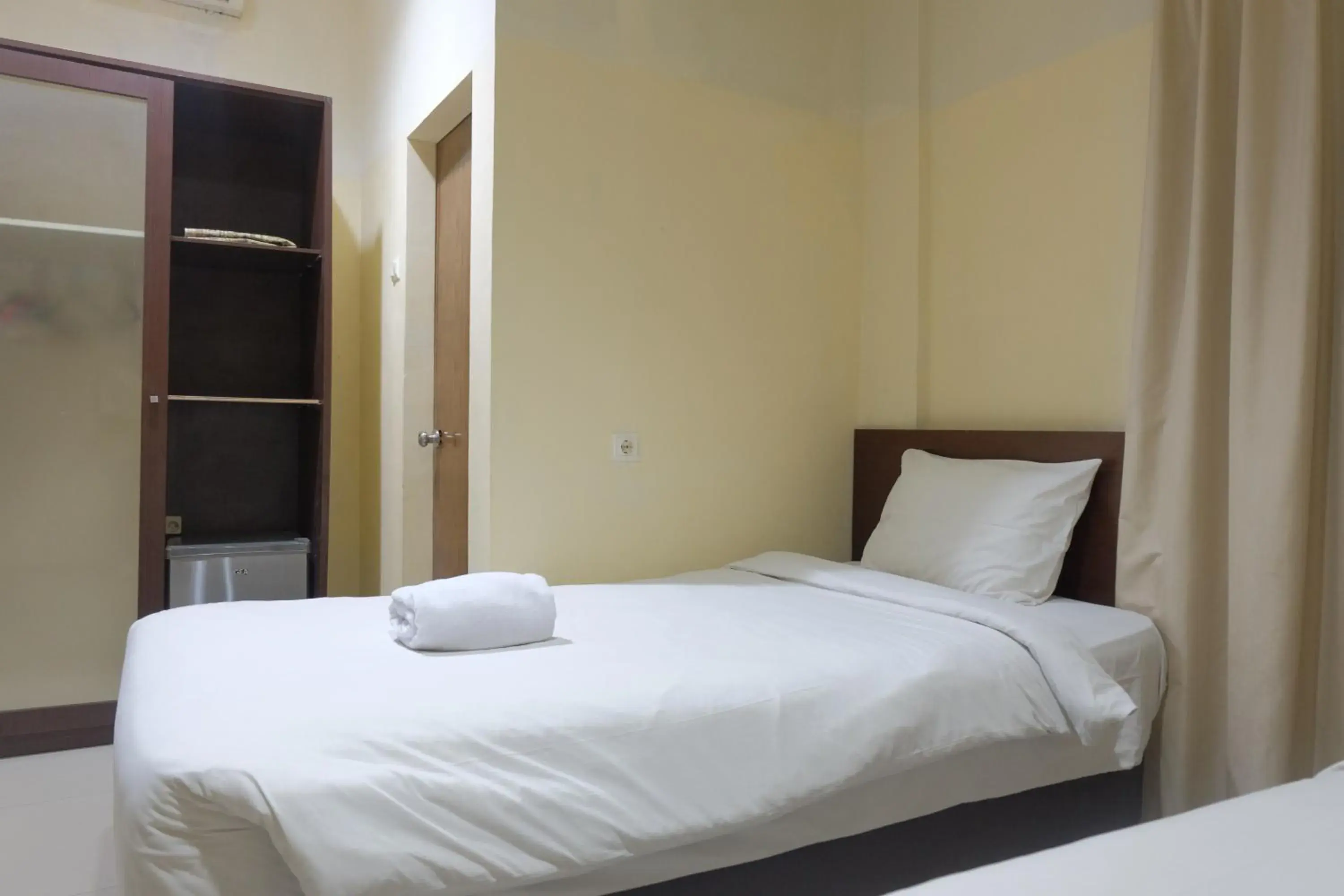 Deluxe Twin Room in De Nusantara Hotel Syariah Deluxe Twin Room in De Nusantara Hotel Syariah