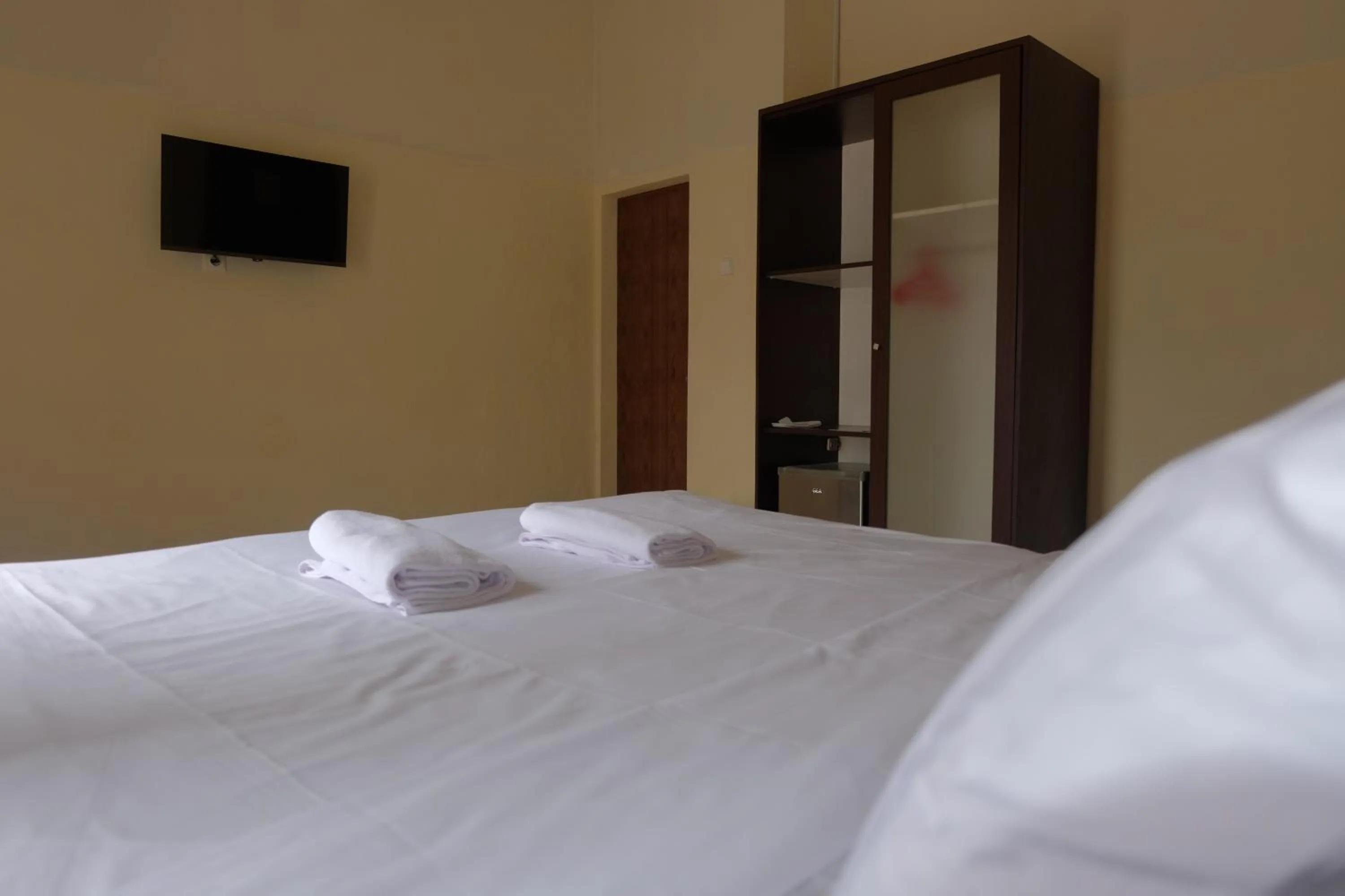 Area and facilities, Bed in De Nusantara Hotel Syariah
