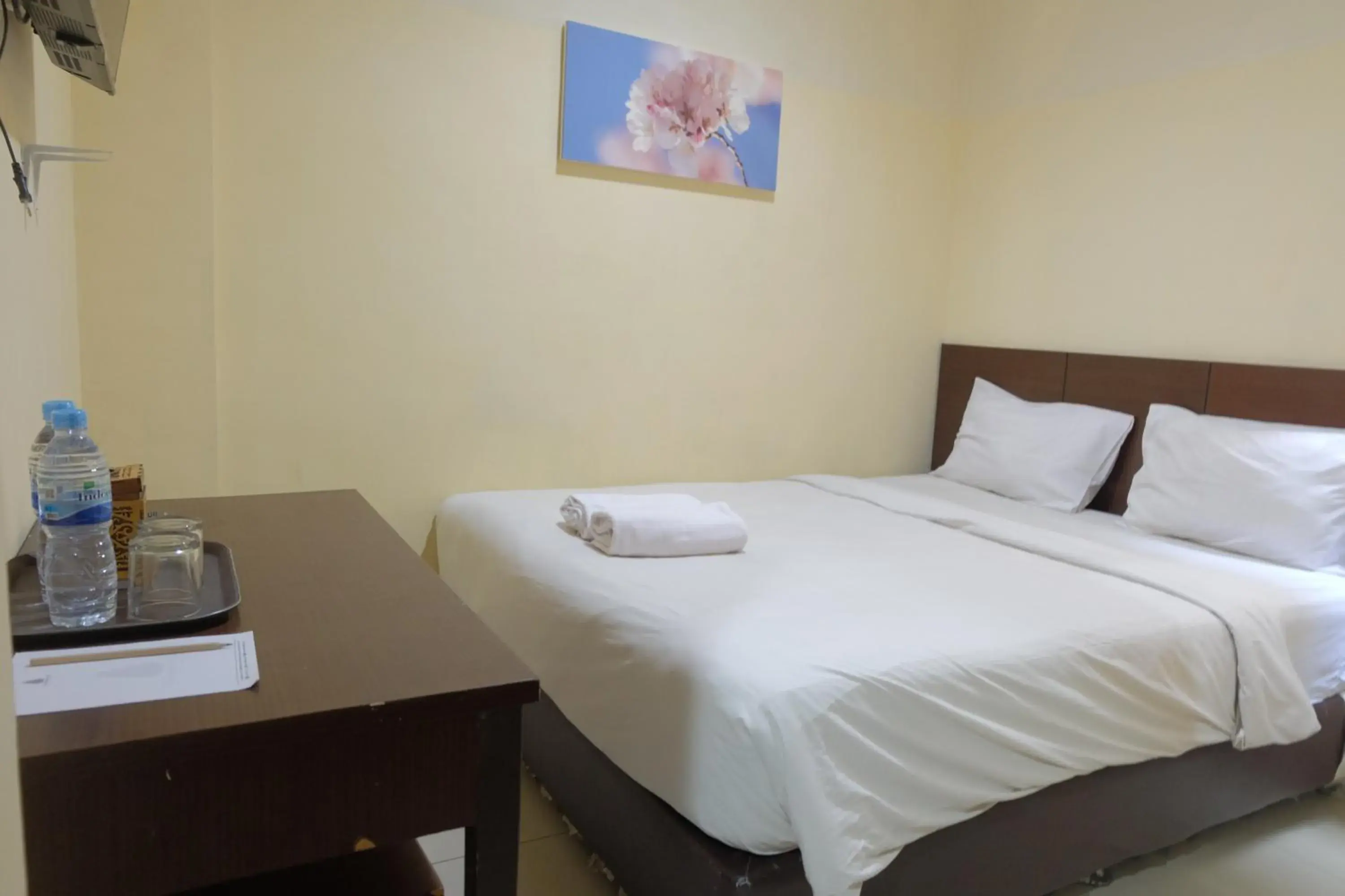 Deluxe Double Room in De Nusantara Hotel Syariah Deluxe Double Room in De Nusantara Hotel Syariah