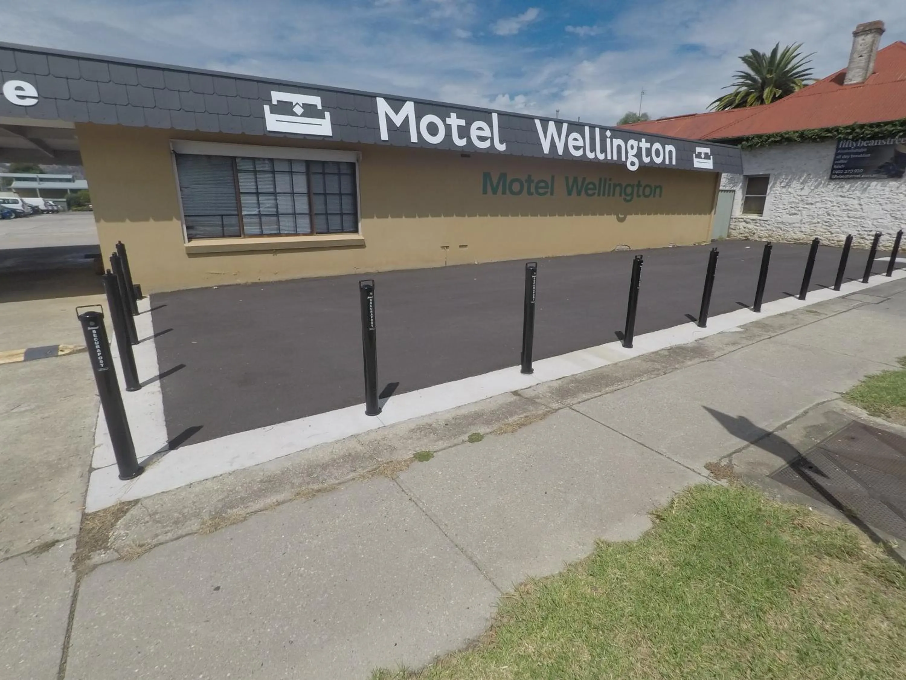 Property logo or sign in Motel Wellington Wodonga