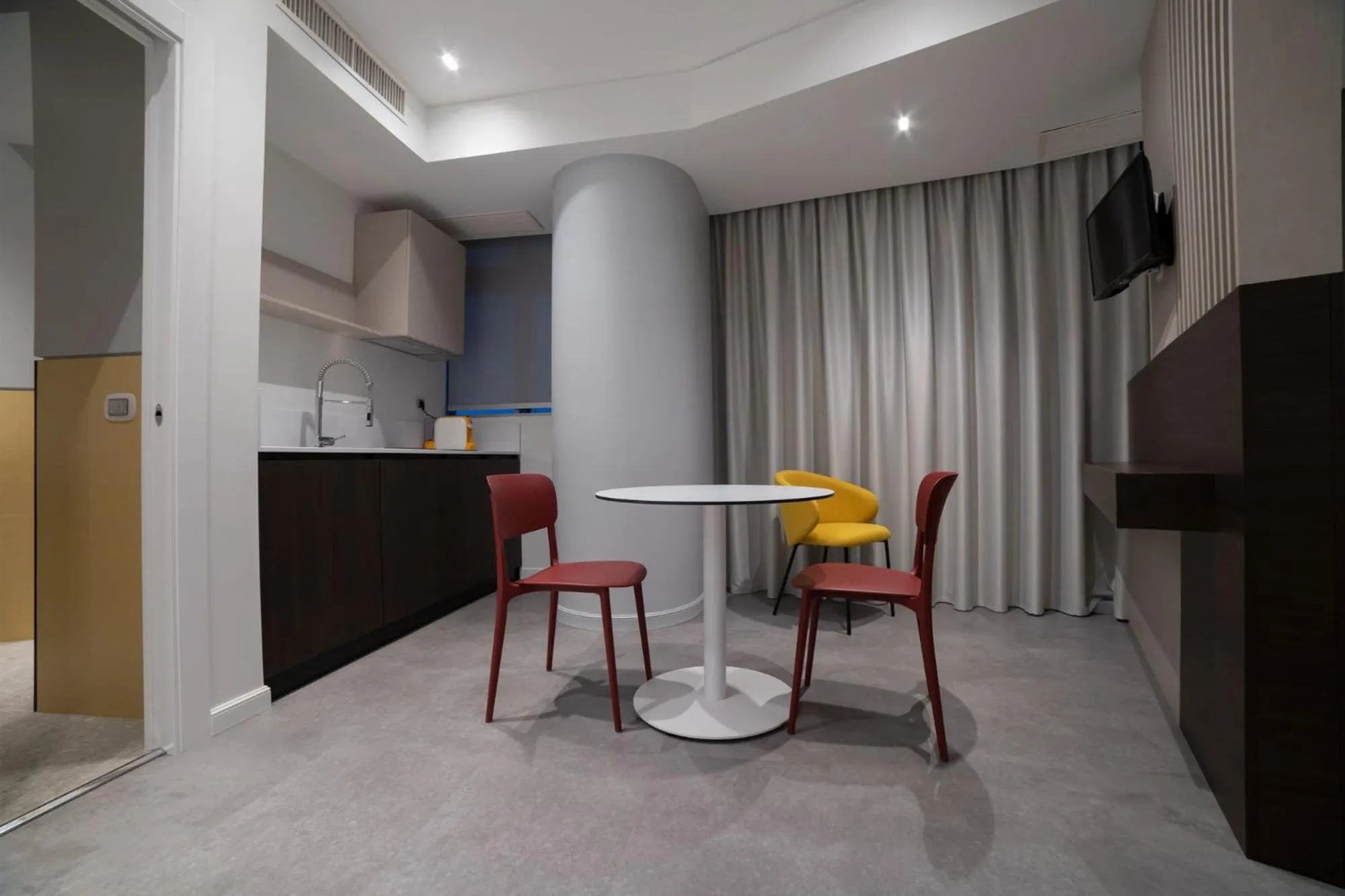 Kitchen or kitchenette in Marconi Hotel