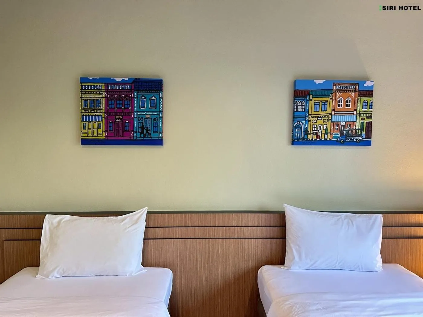 Bed in Siri Hotel Phuket