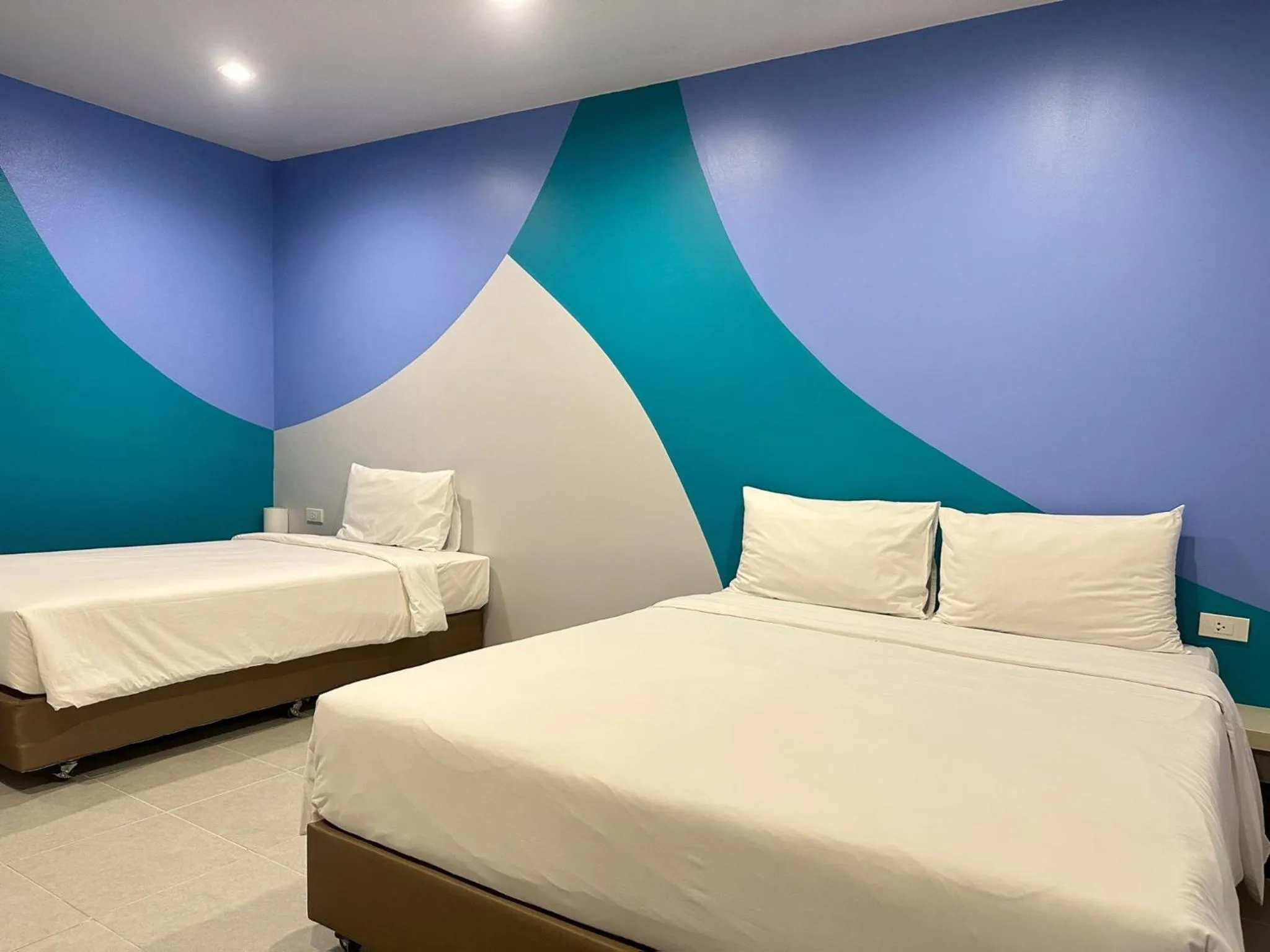 Bed in Siri Hotel Phuket