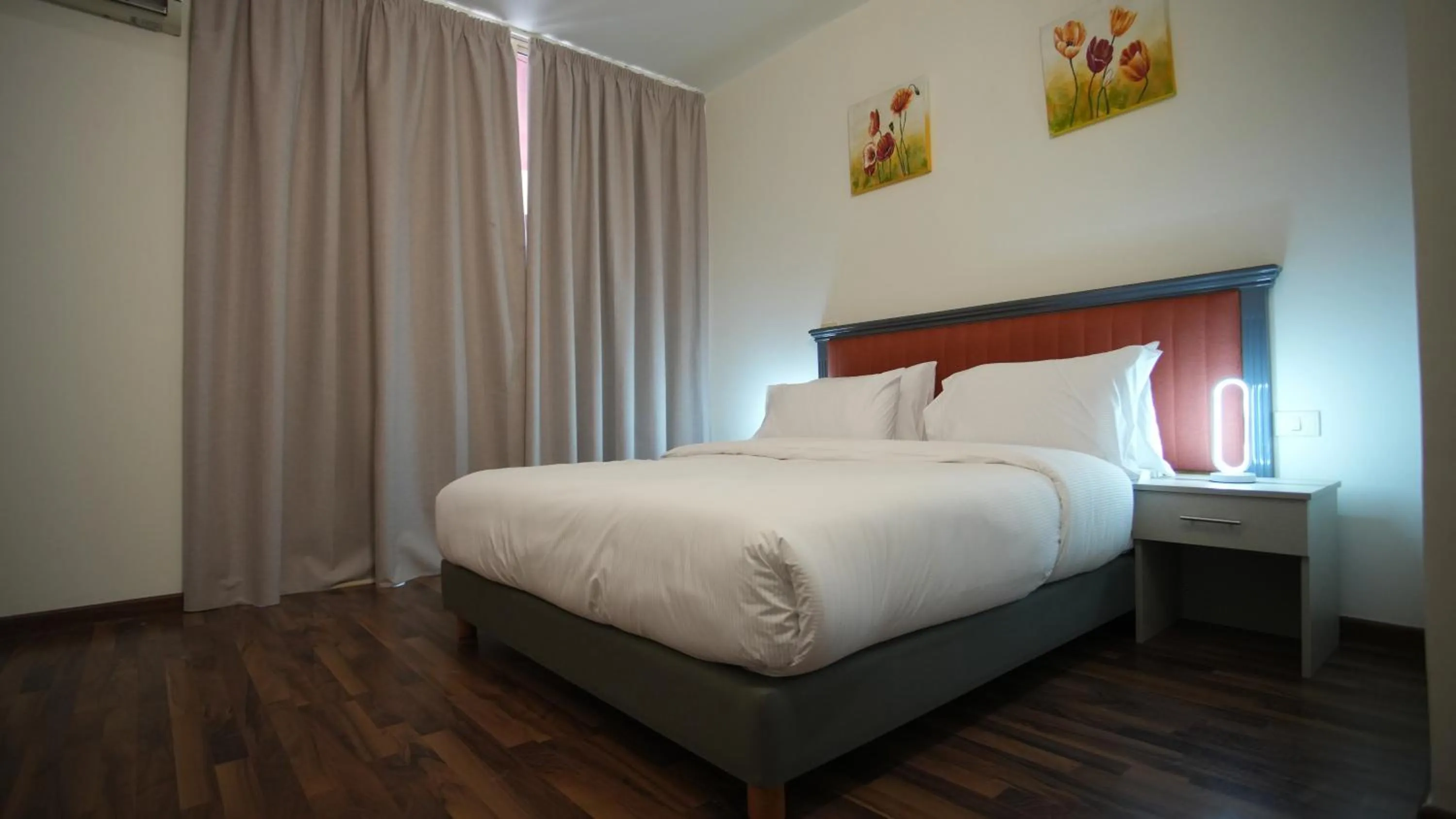 Bed in Manara Riva Suites