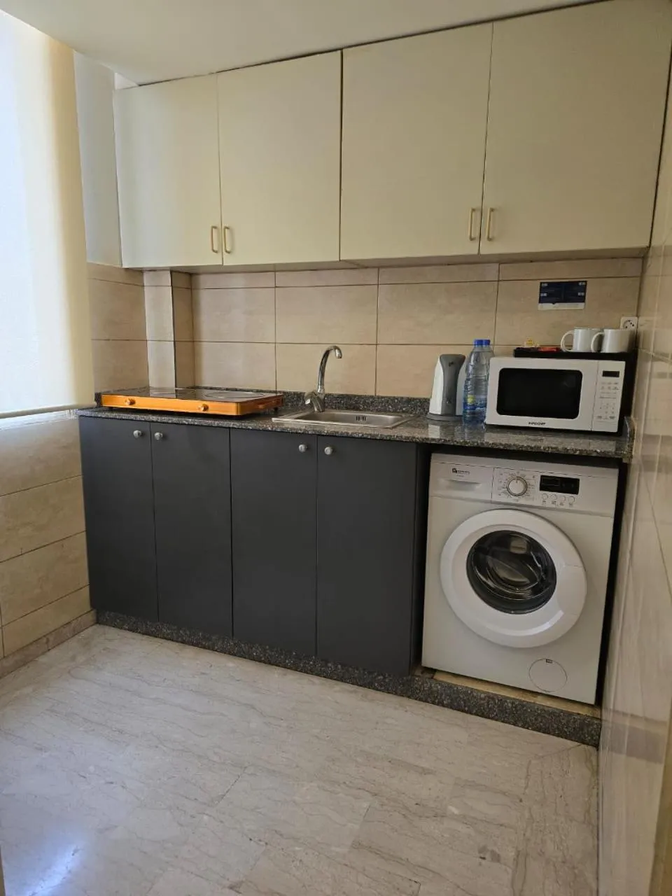 Kitchen or kitchenette in Manara Riva Suites