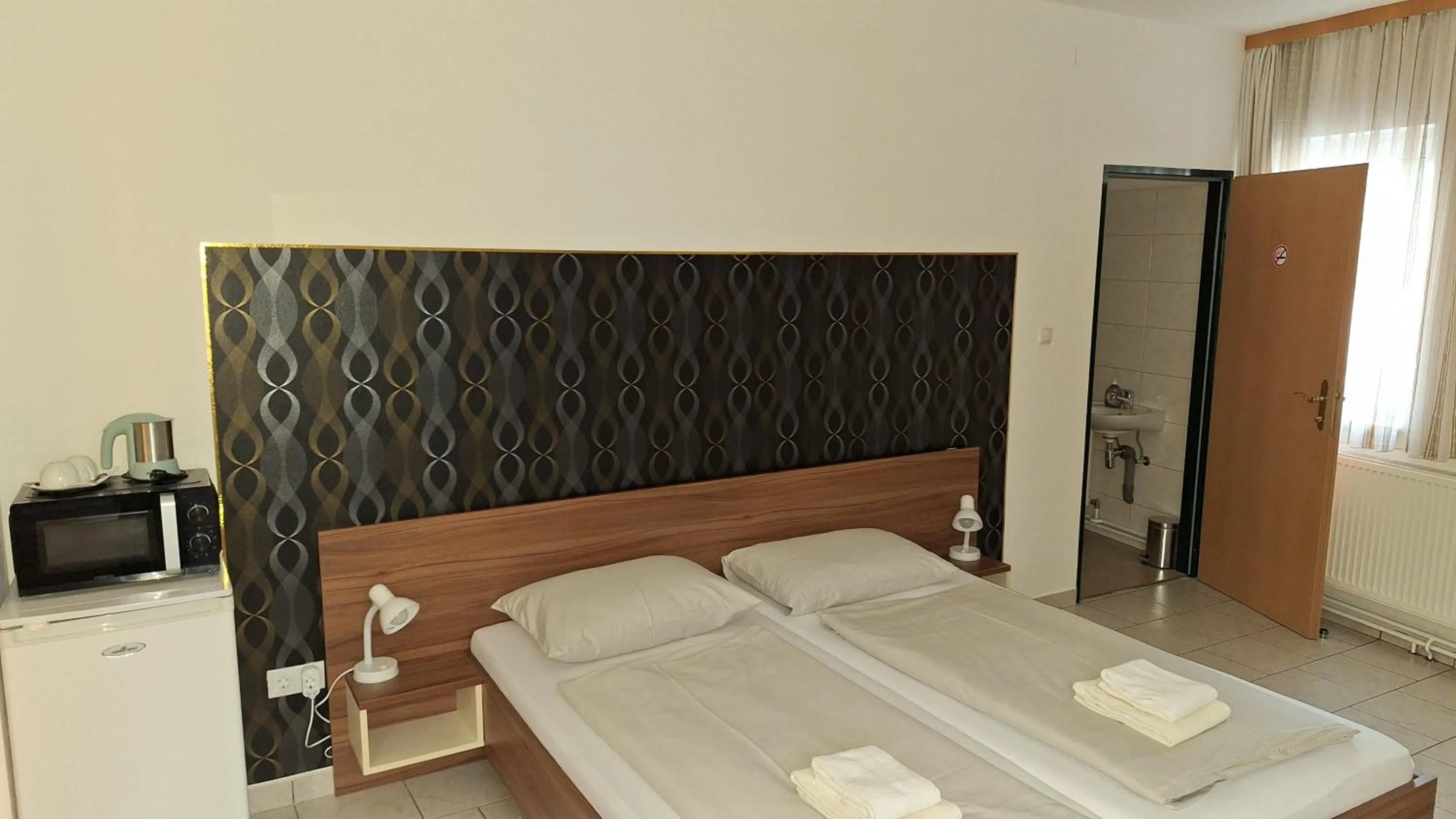 Bed in Pension Haus Nova