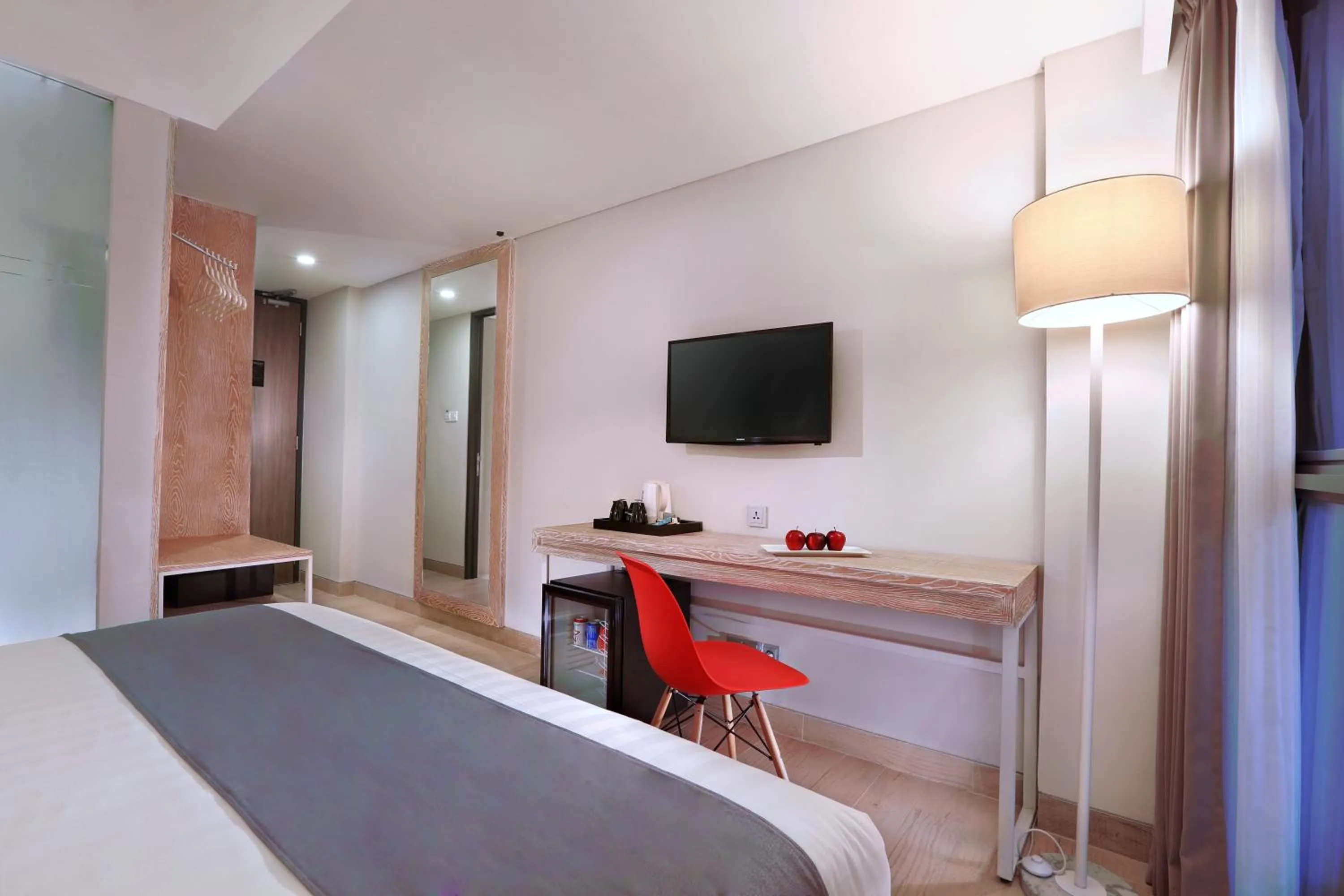 Bed in Hotel NEO+ Kuta Legian by ASTON