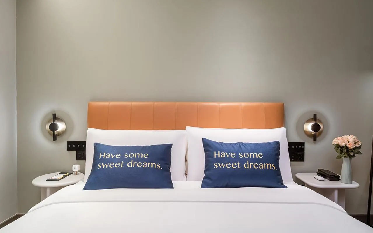 Bed in The Mustel Hotel Chongqing Hongyadong