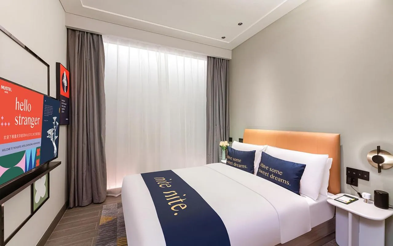Bed in The Mustel Hotel Chongqing Hongyadong