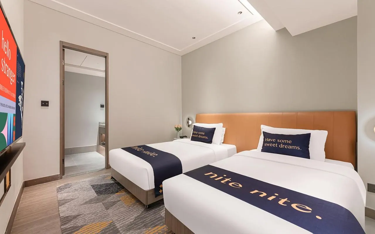 Bed in The Mustel Hotel Chongqing Hongyadong