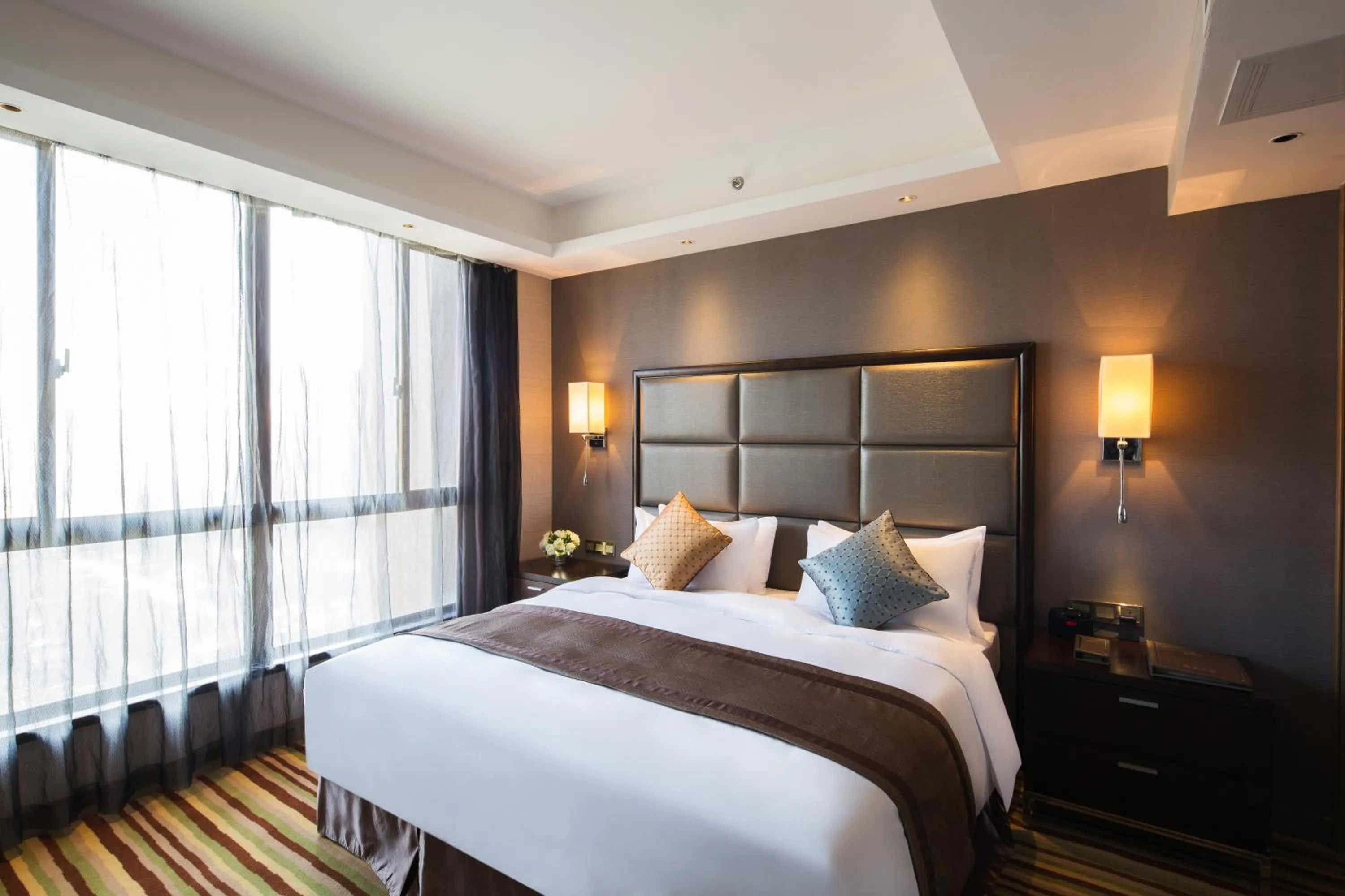 Bed in Millennium Hotel Fuqing