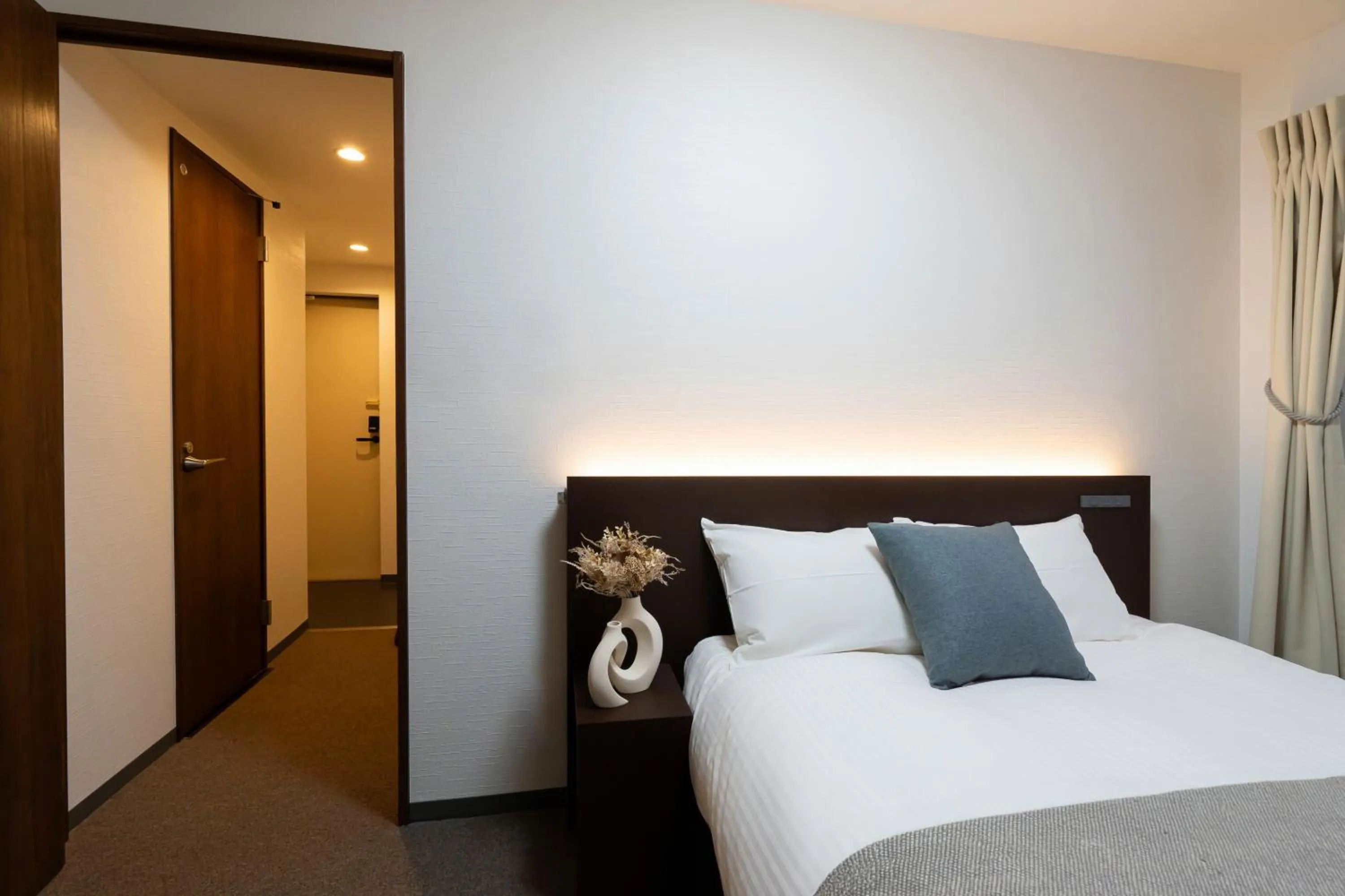 Bed in Residence Hotel Sapporo Susukino