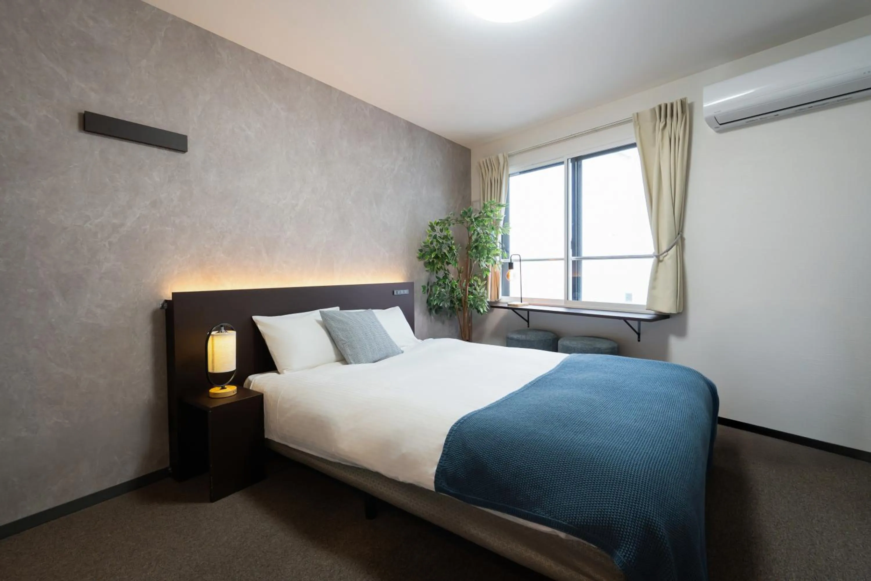 Bed in Residence Hotel Sapporo Susukino