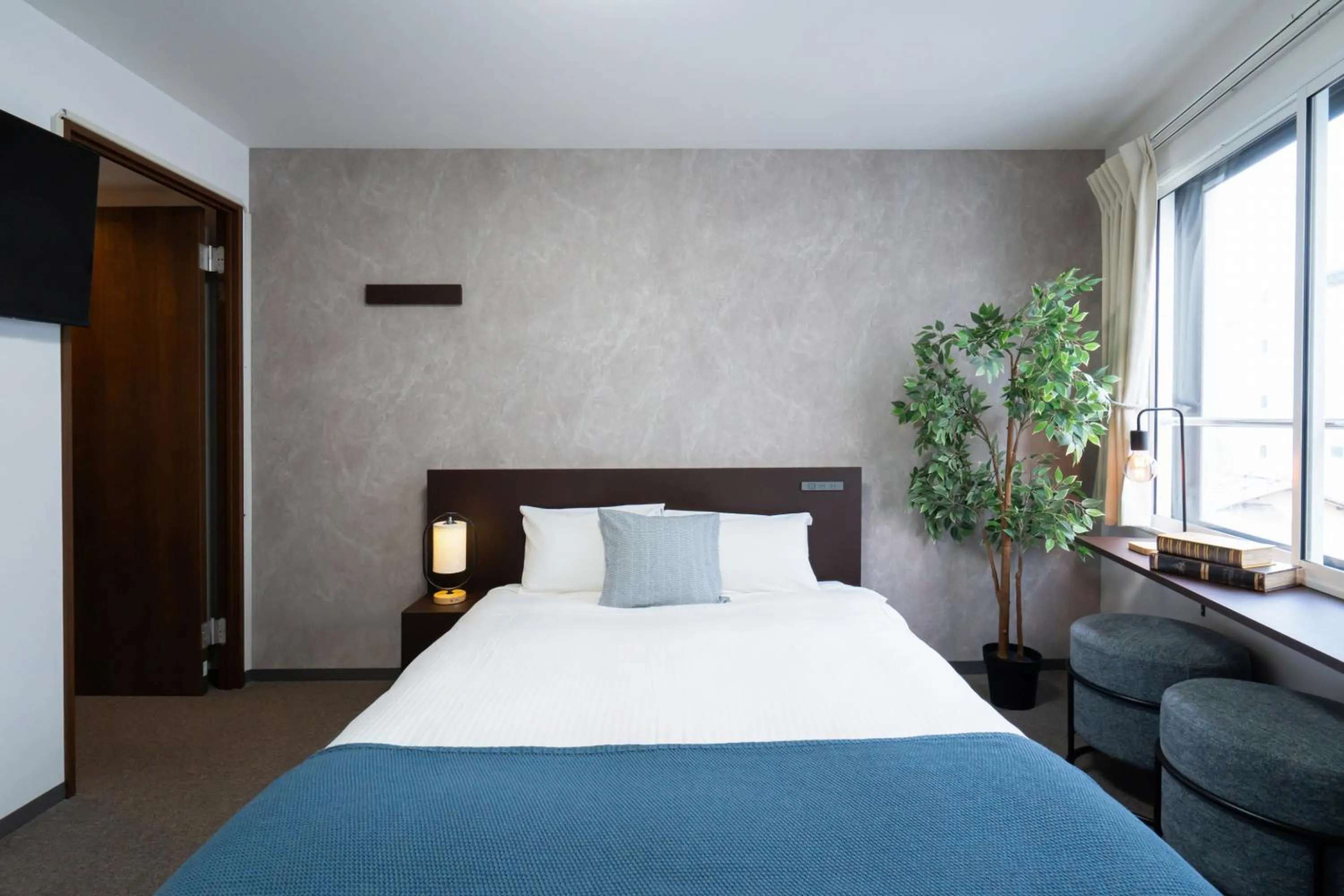 Bed in Residence Hotel Sapporo Susukino