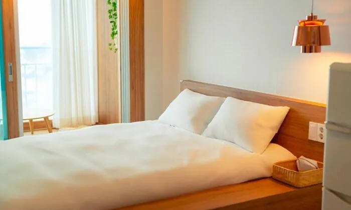 Bed in Geojae Mins Pension