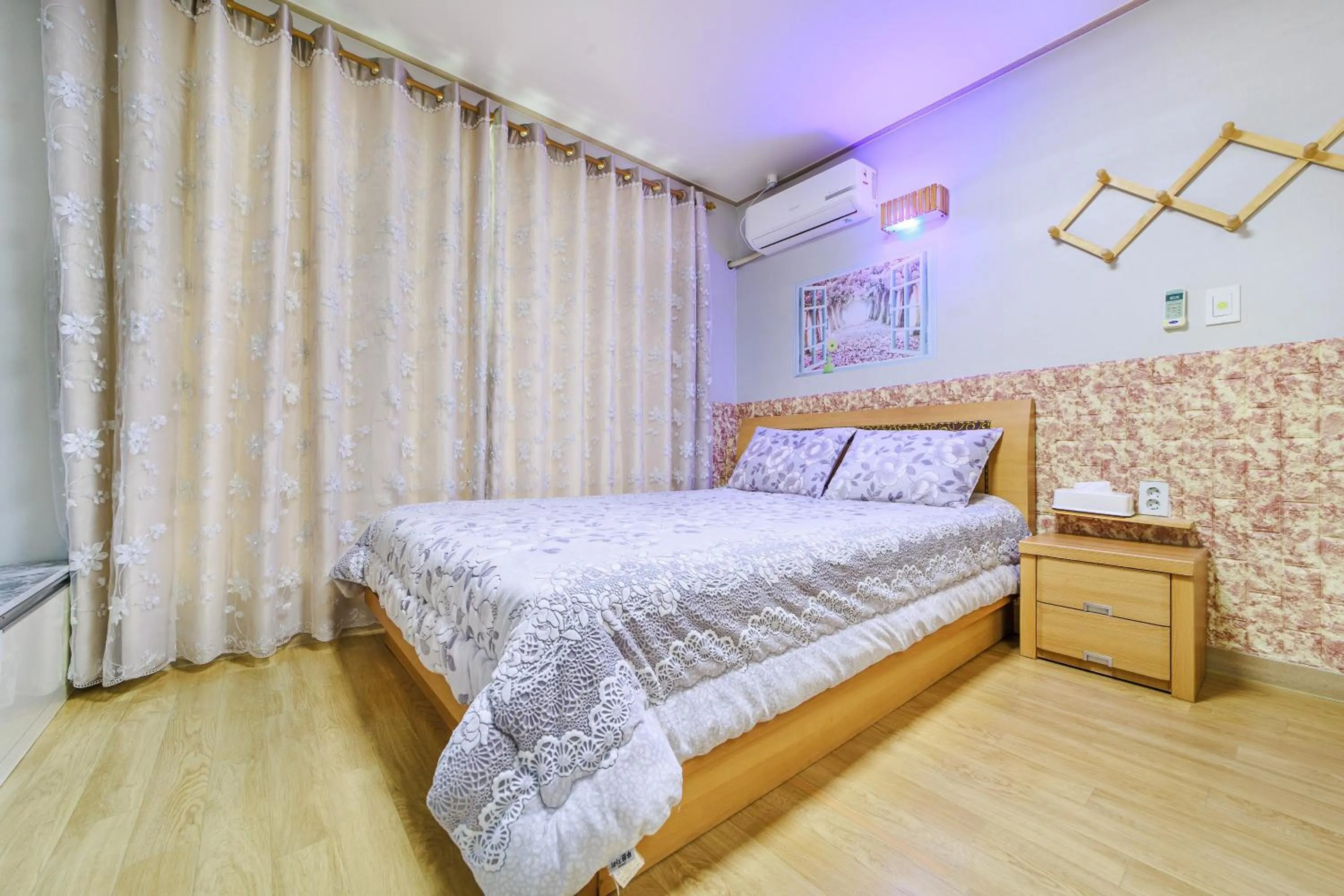 Bed in Sokcho Santolini Pension