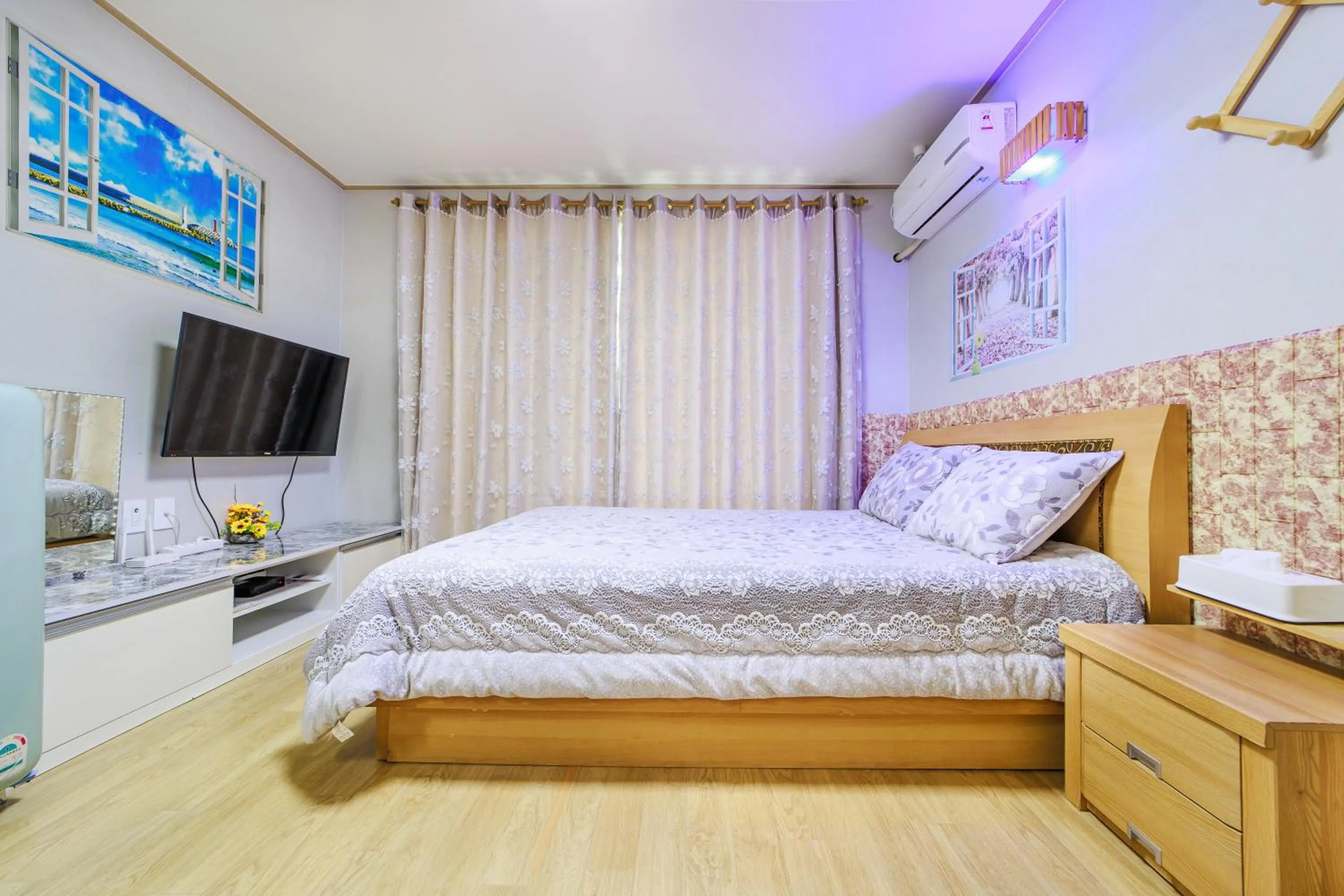 Bed in Sokcho Santolini Pension