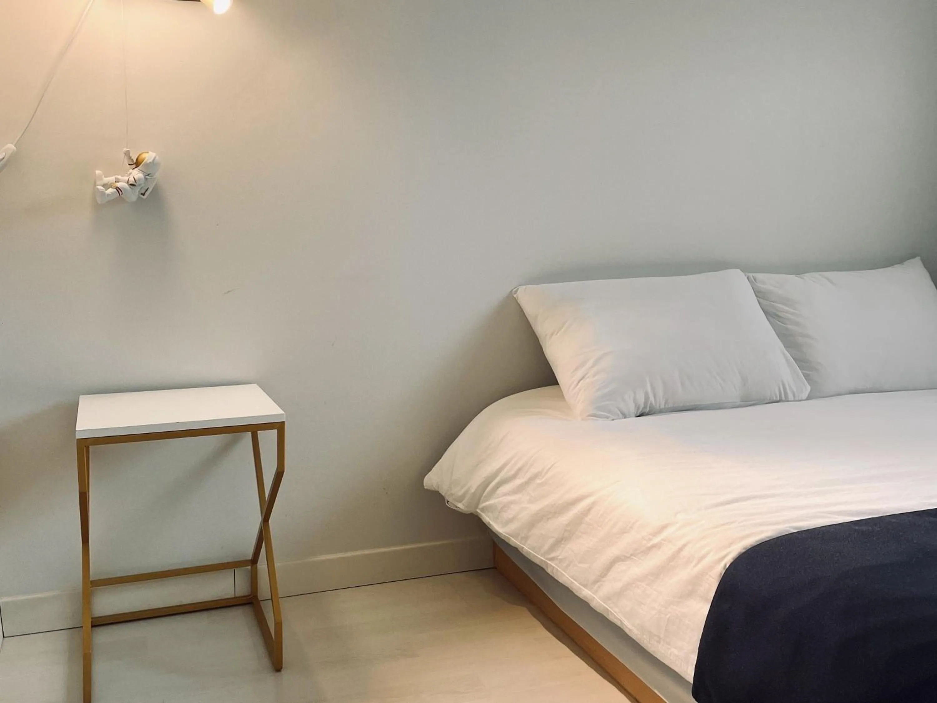 Bed in Jeju Private Poolvilla Gwakjidaon Stay