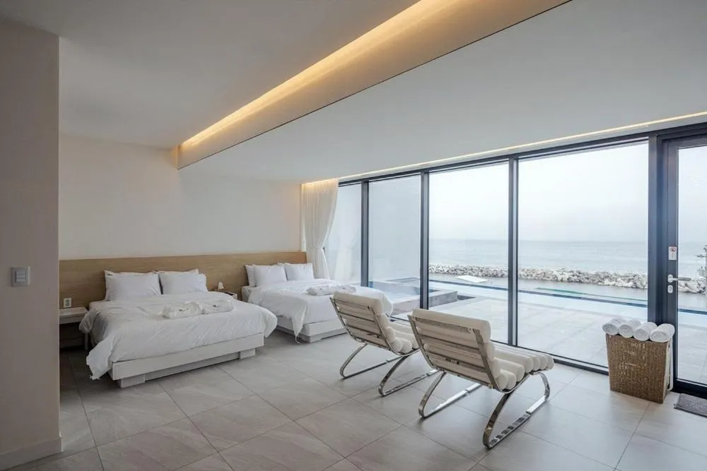 Bed in Pohang Madame Annette Pool Villa dogs allowed