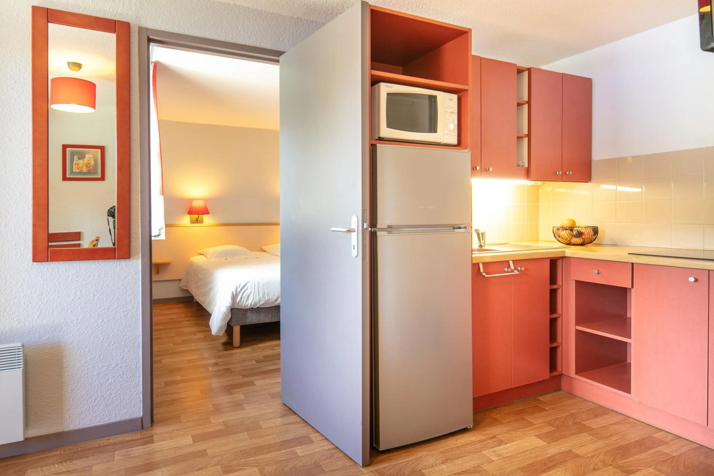 Kitchen or kitchenette, Bed in VVF Les 7 Laux Massif de Belledonne