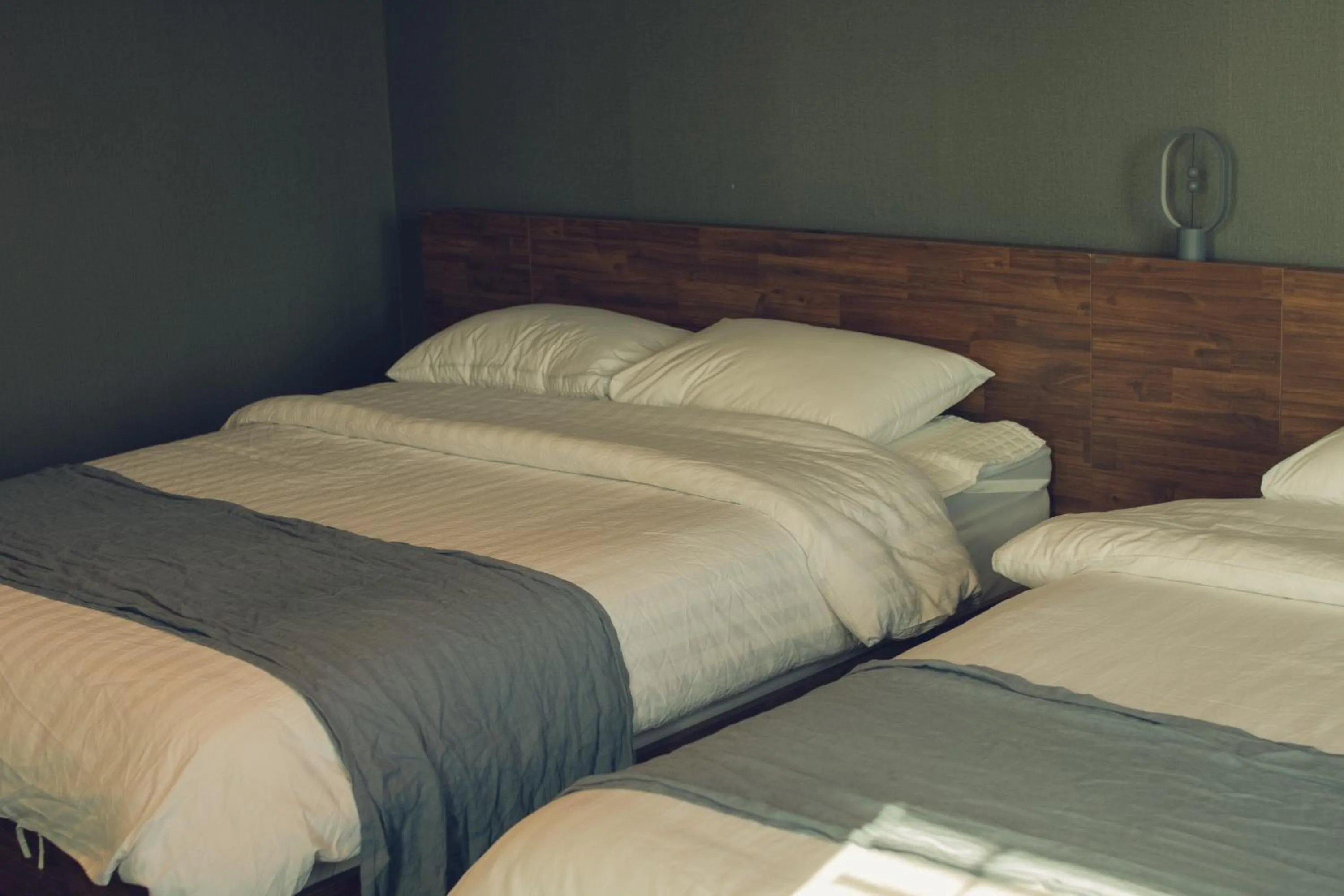 Bed in Jeju Blanc Jade Pool Villa