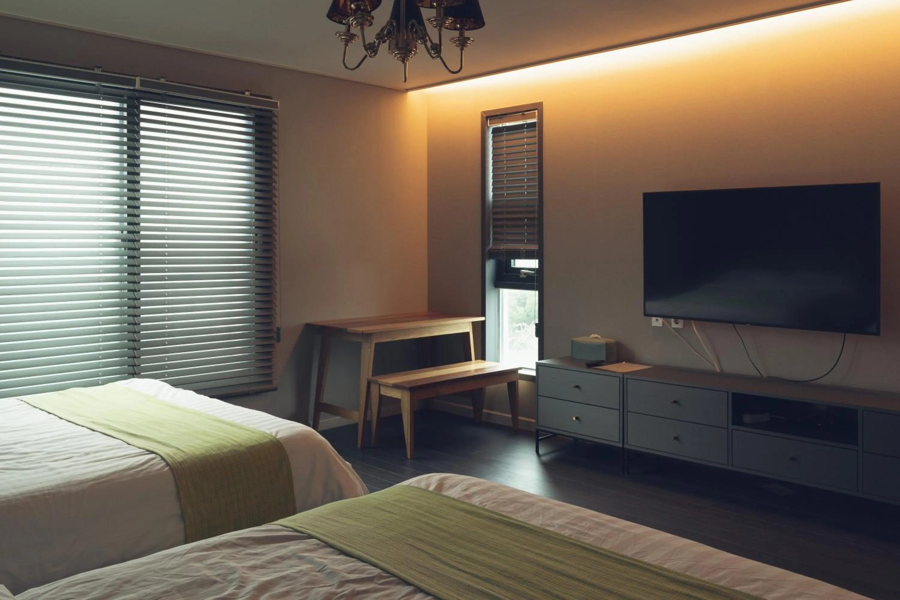 Bed in Jeju Blanc Jade Pool Villa