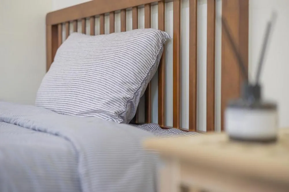 Bed in Geoje Yolo Guesthouse