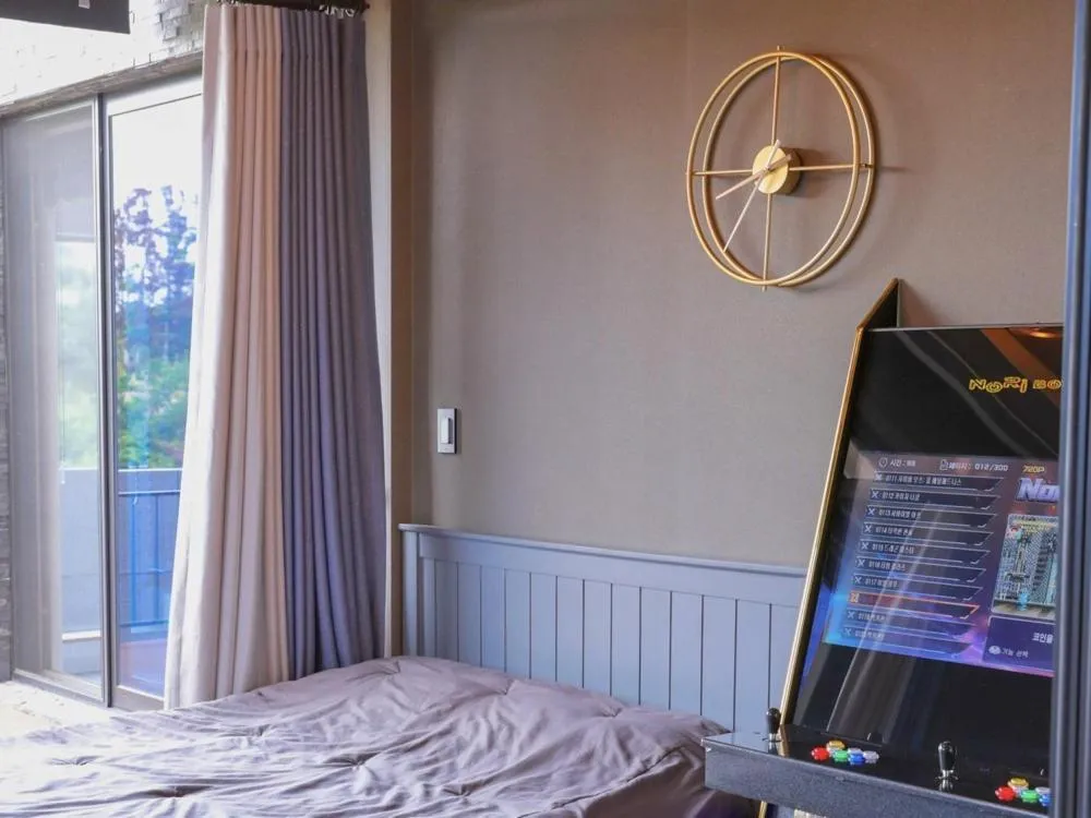 Bed in Jeju Sky Castle Pool Villa