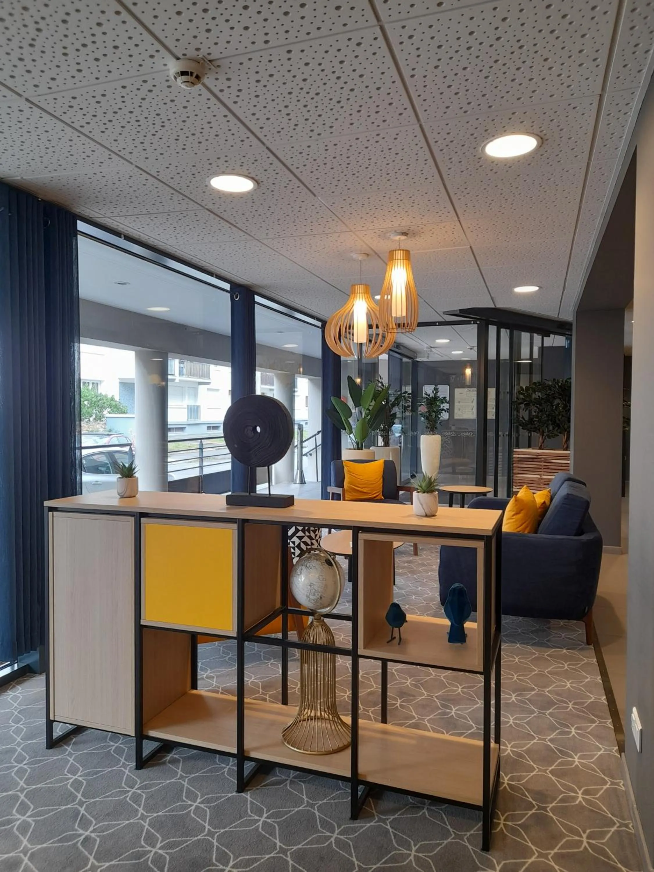 Seating area in Appart Hotel Odalys City Rennes Lorgeril