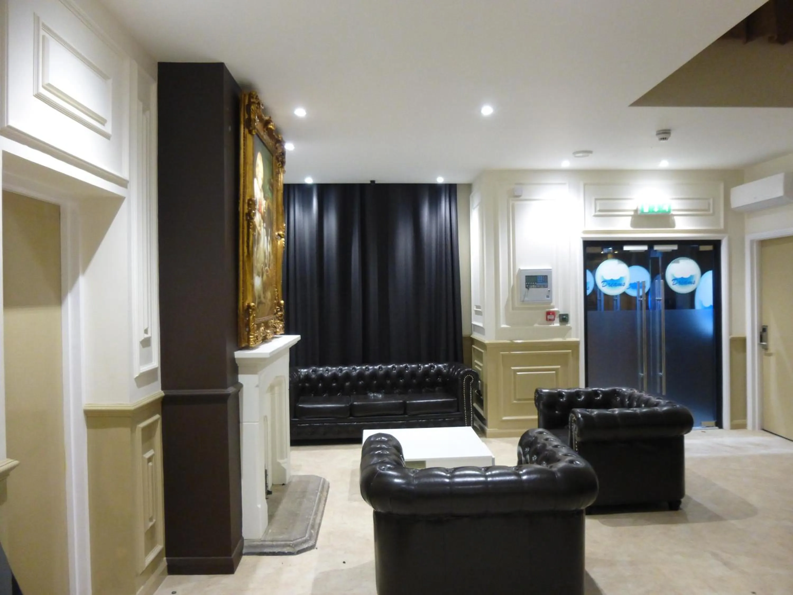 Communal lounge/ TV room in Dreams Hotel