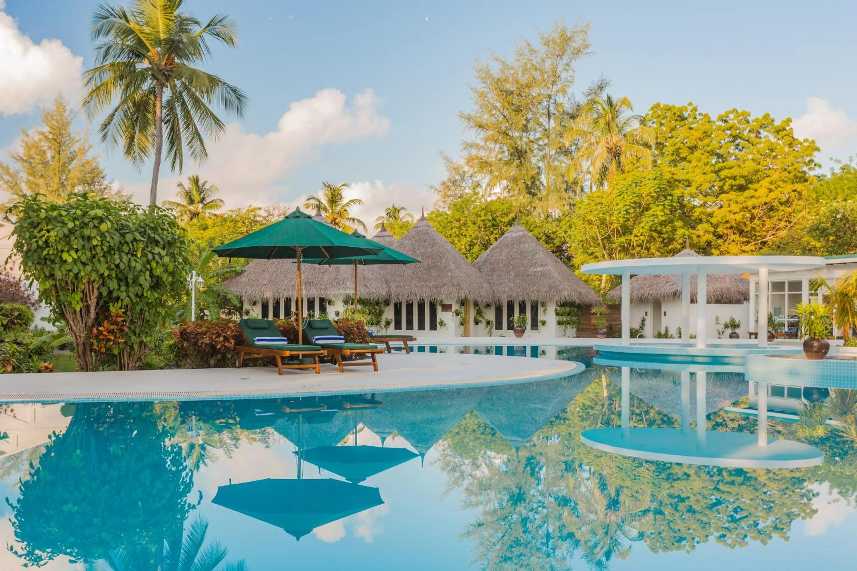 Pool view in Equator Village Maldives