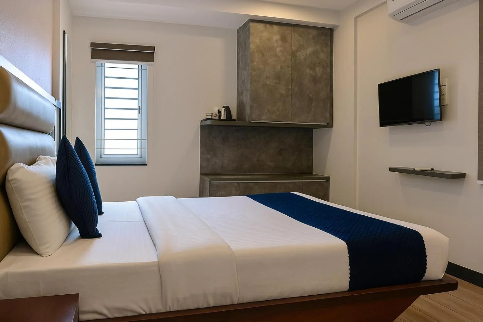 Bed in Hotel Rize Inn