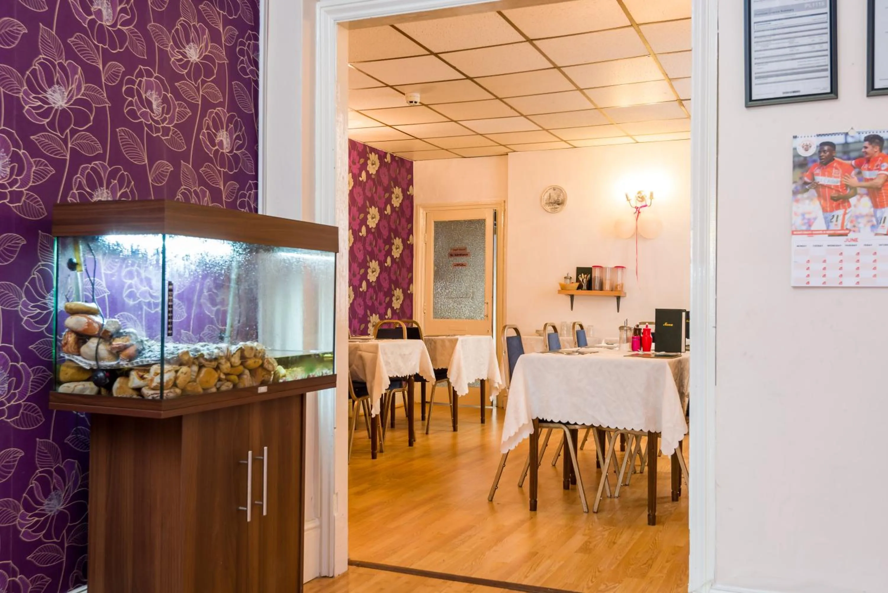 Dining area in UK Travel & Hospitality LTD TA Canberra Hotel