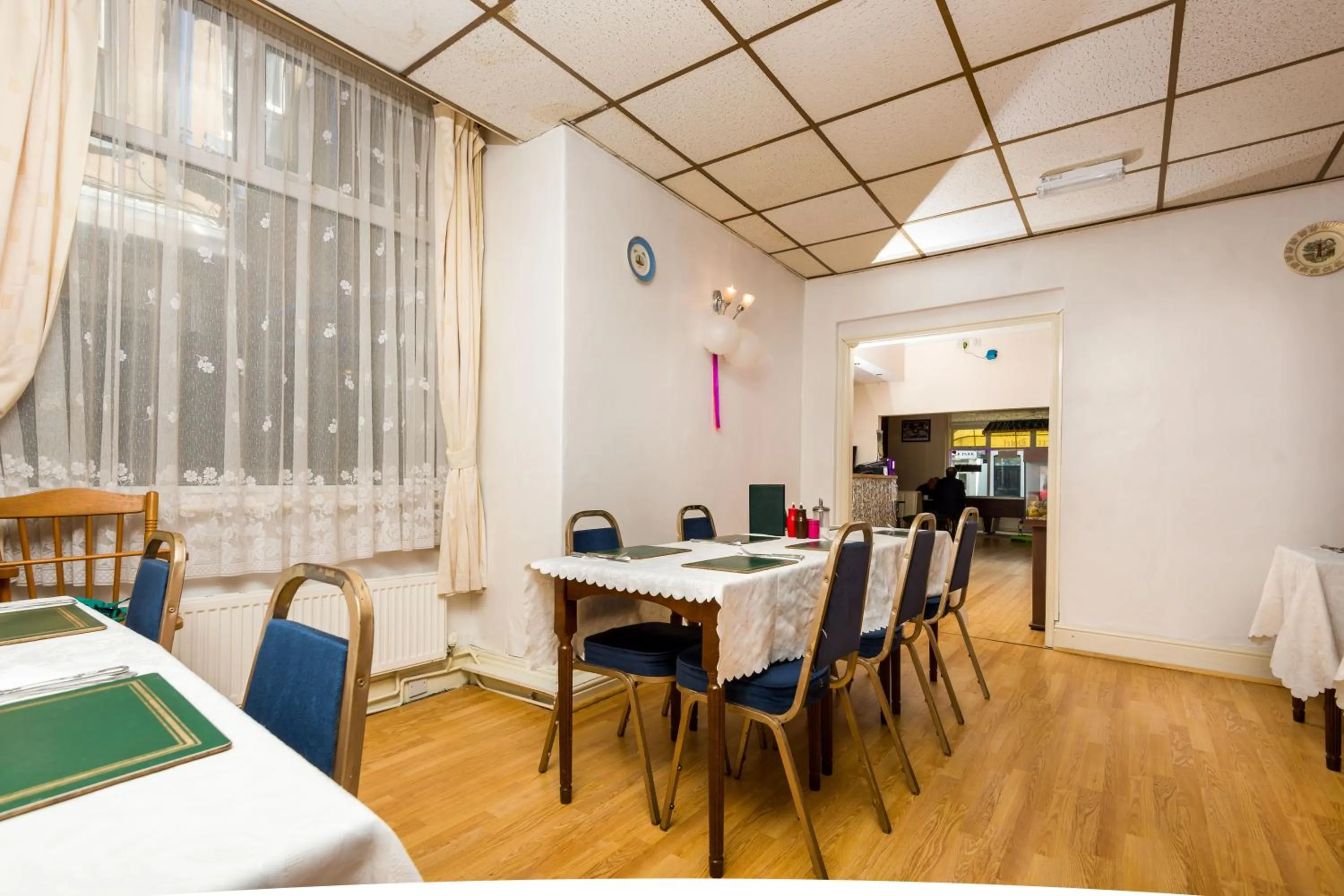 Dining area in UK Travel & Hospitality LTD TA Canberra Hotel