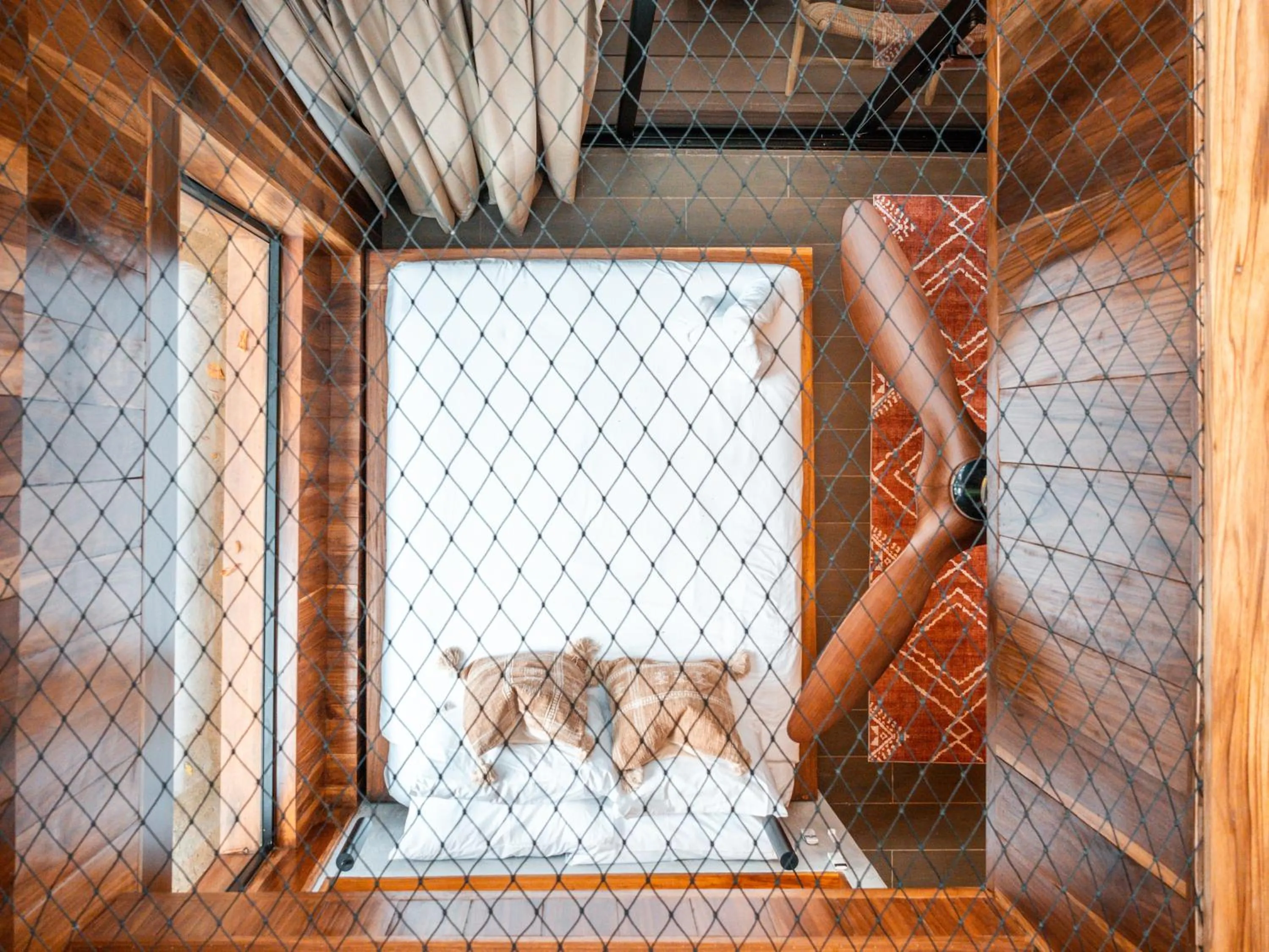 Bed in Palmar Beach Lodge