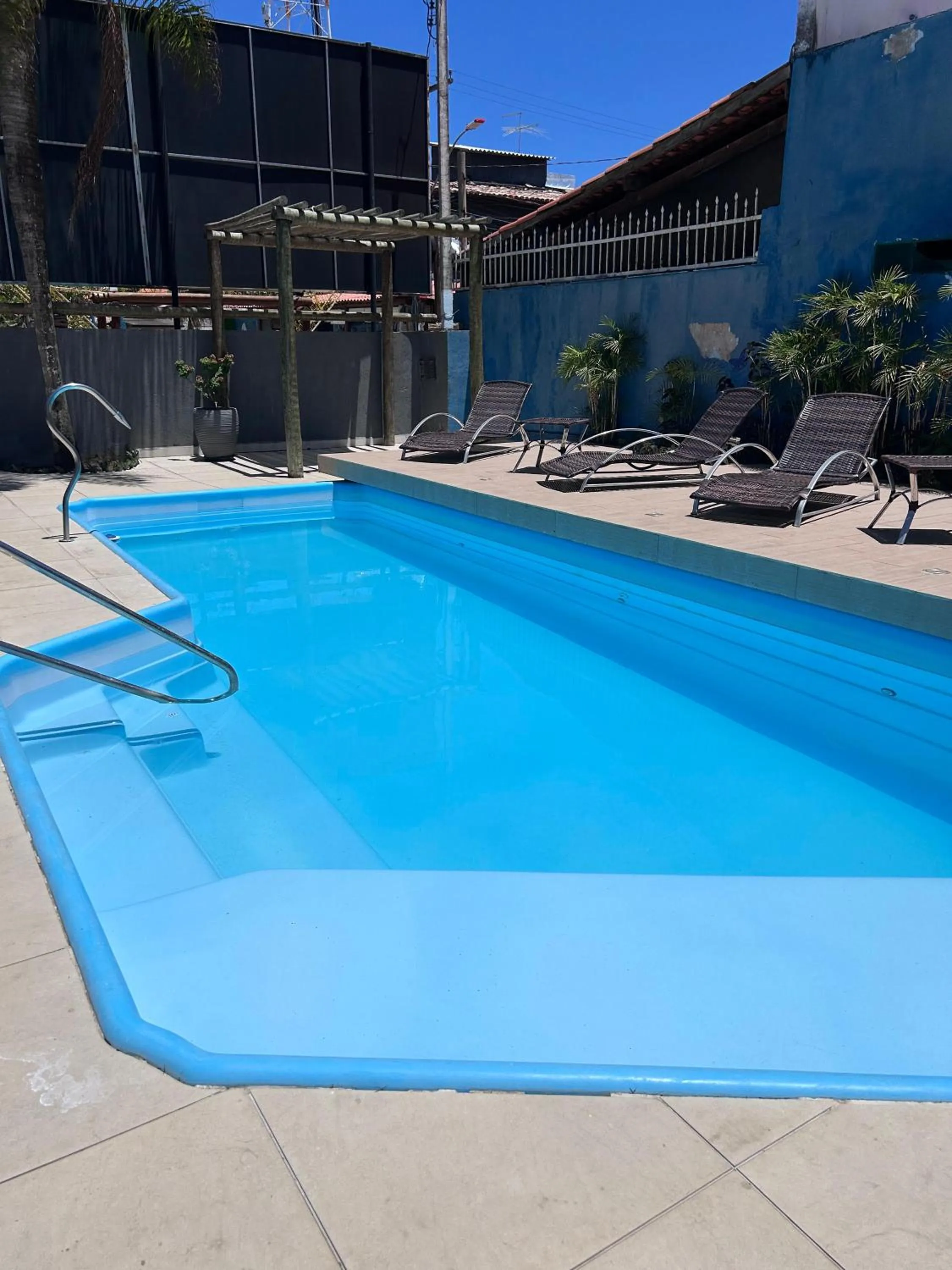 Swimming pool in Pousada Aconchego