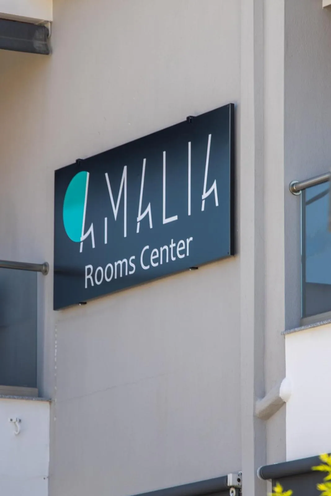 Property logo or sign in Amalia Center