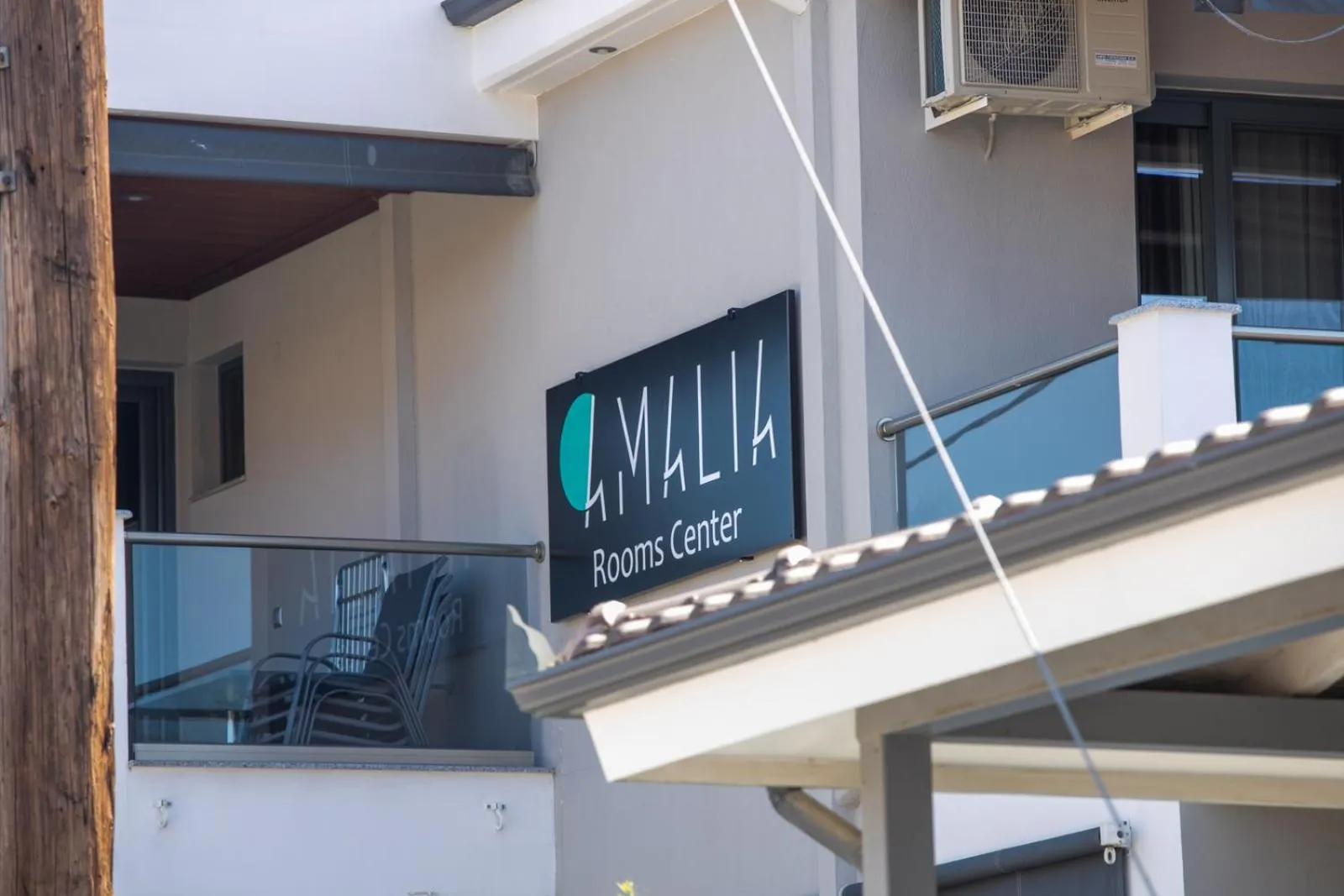 Property logo or sign in Amalia Center